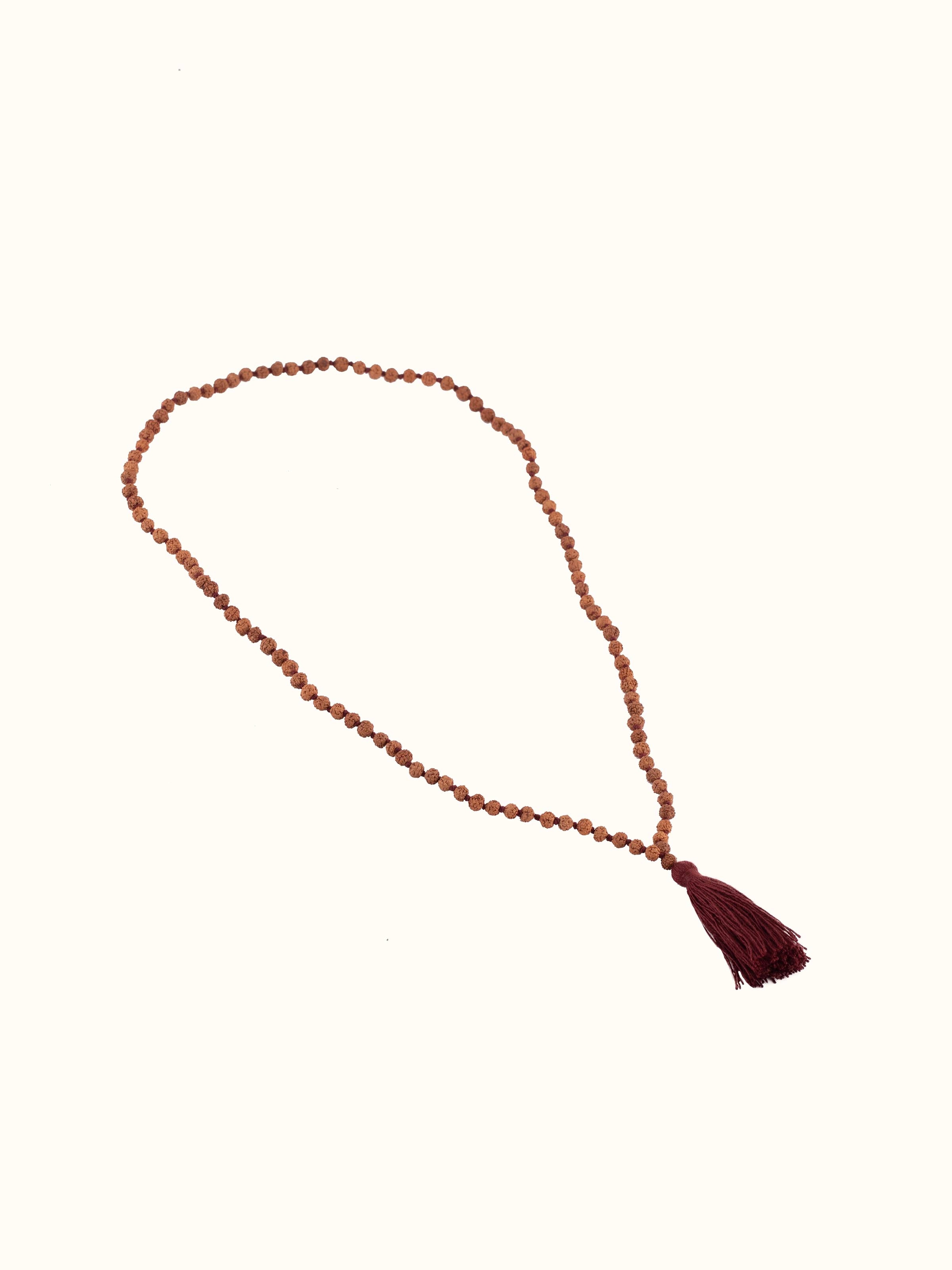 Overhead view of Panchmukhi Rudraksha Mala (7mm), displaying the symmetrical arrangement and spiritual detailing