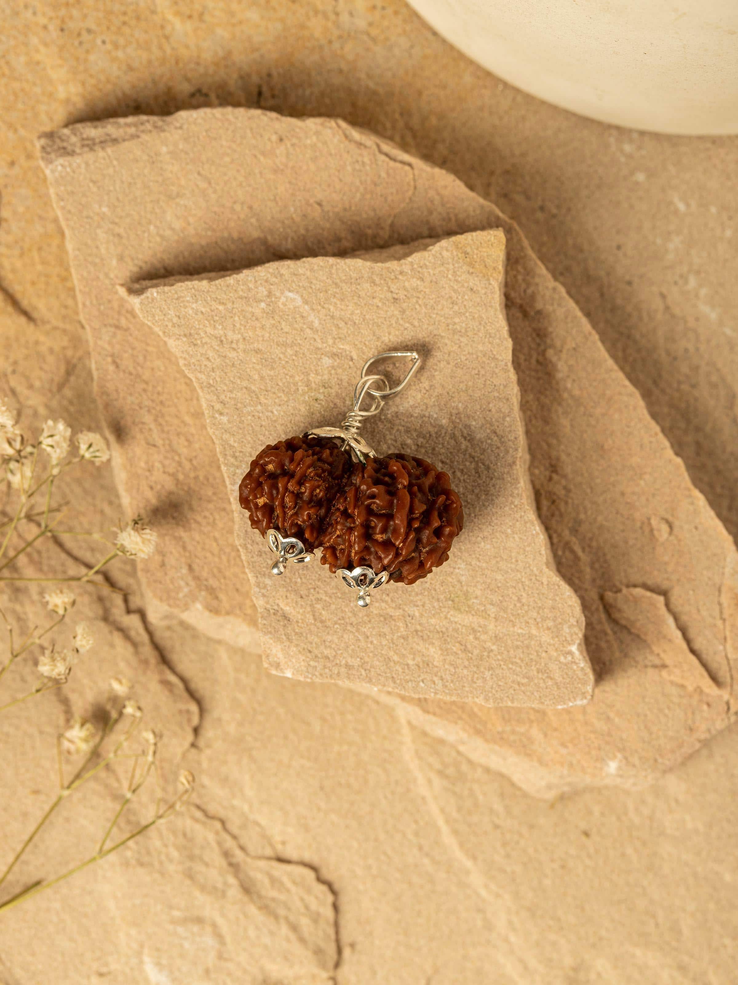 Close-up of Gaurishankar Rudraksha Sterling Silver Pendant showing intricate details.