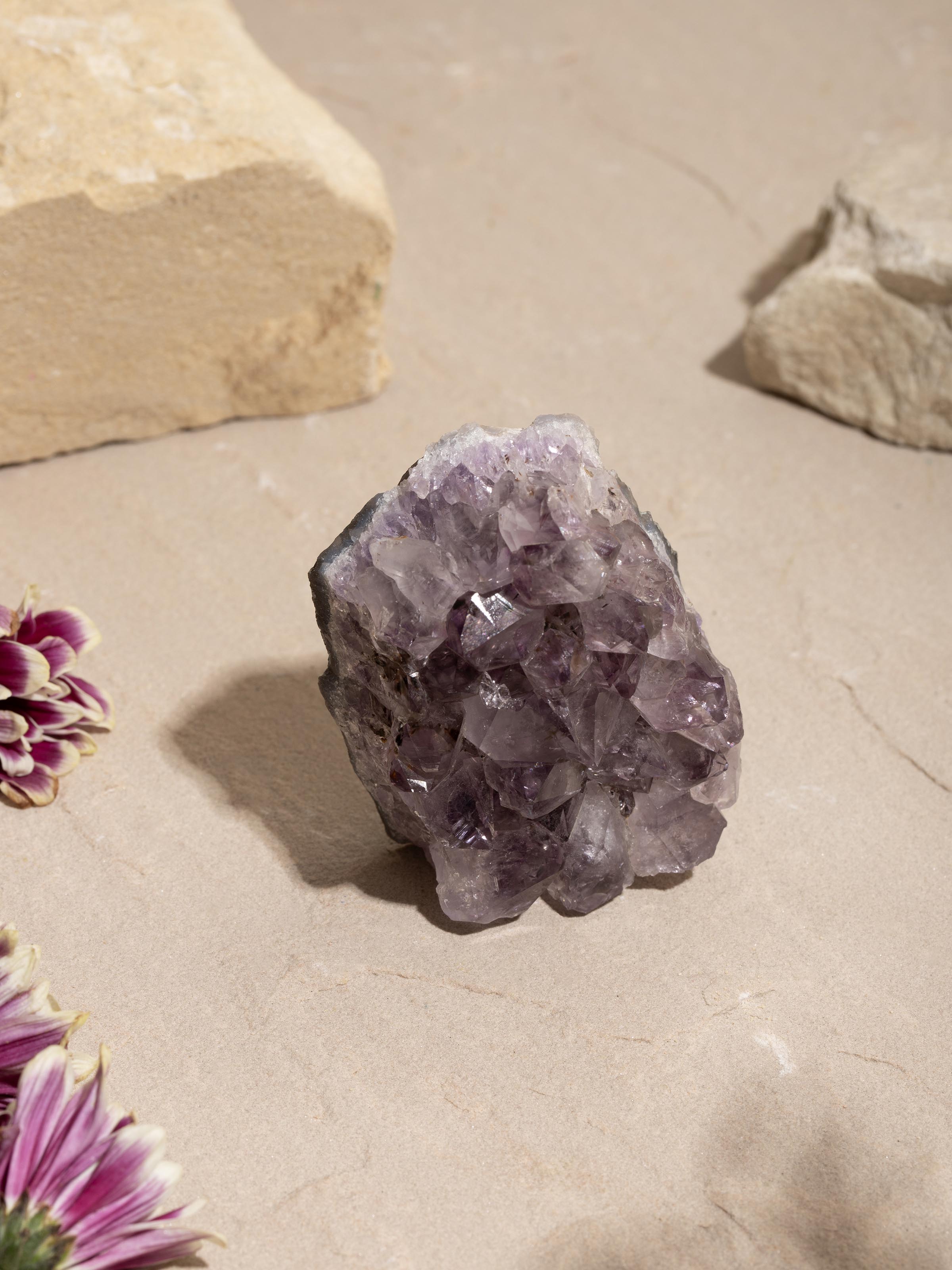 Side view of Amethyst Cluster Healing Stone highlighting the detailed crystal structure and natural texture.