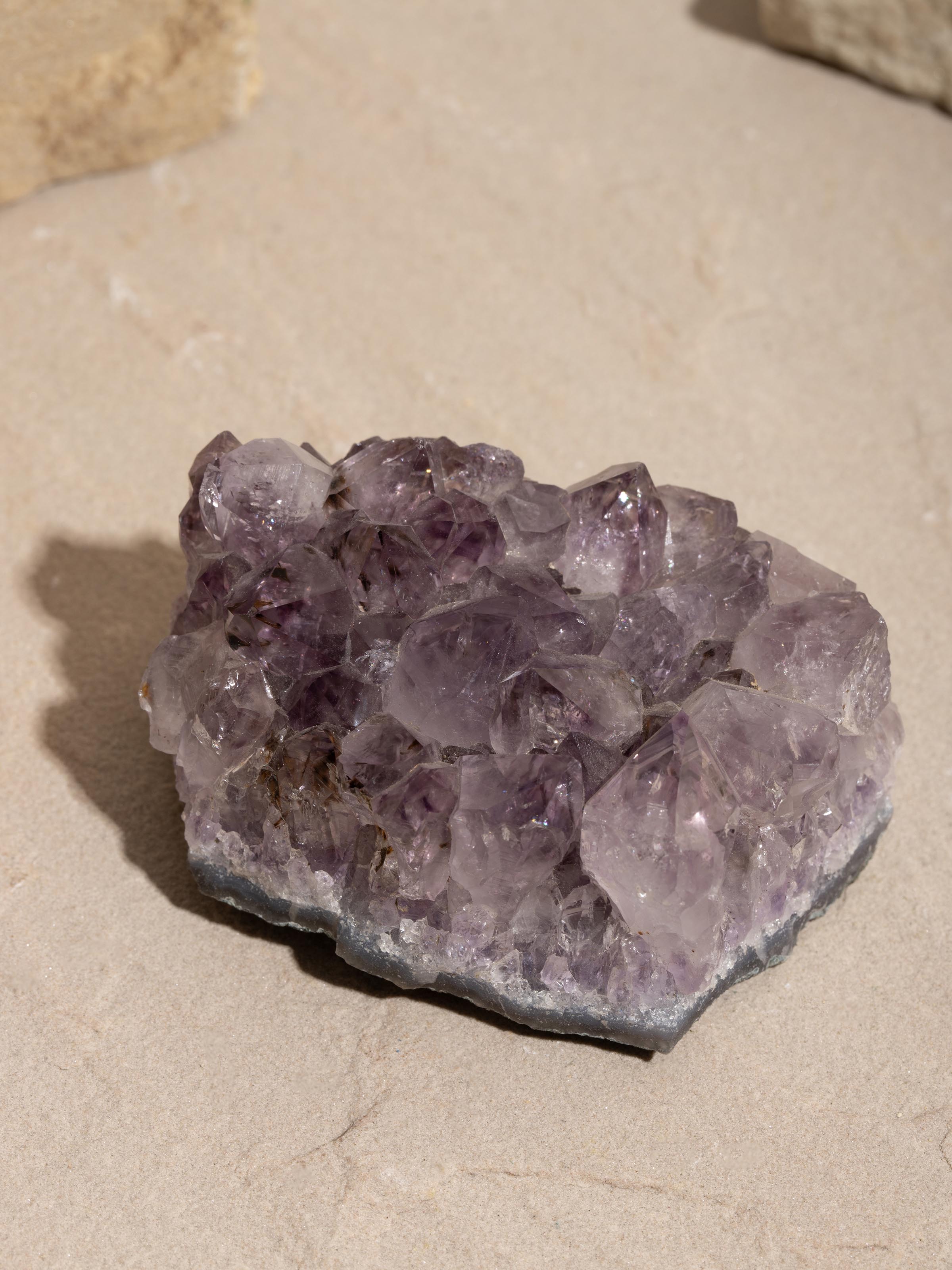 Close-up of Amethyst Cluster Healing Stone focusing on the rich purple hues and unique crystal formations.