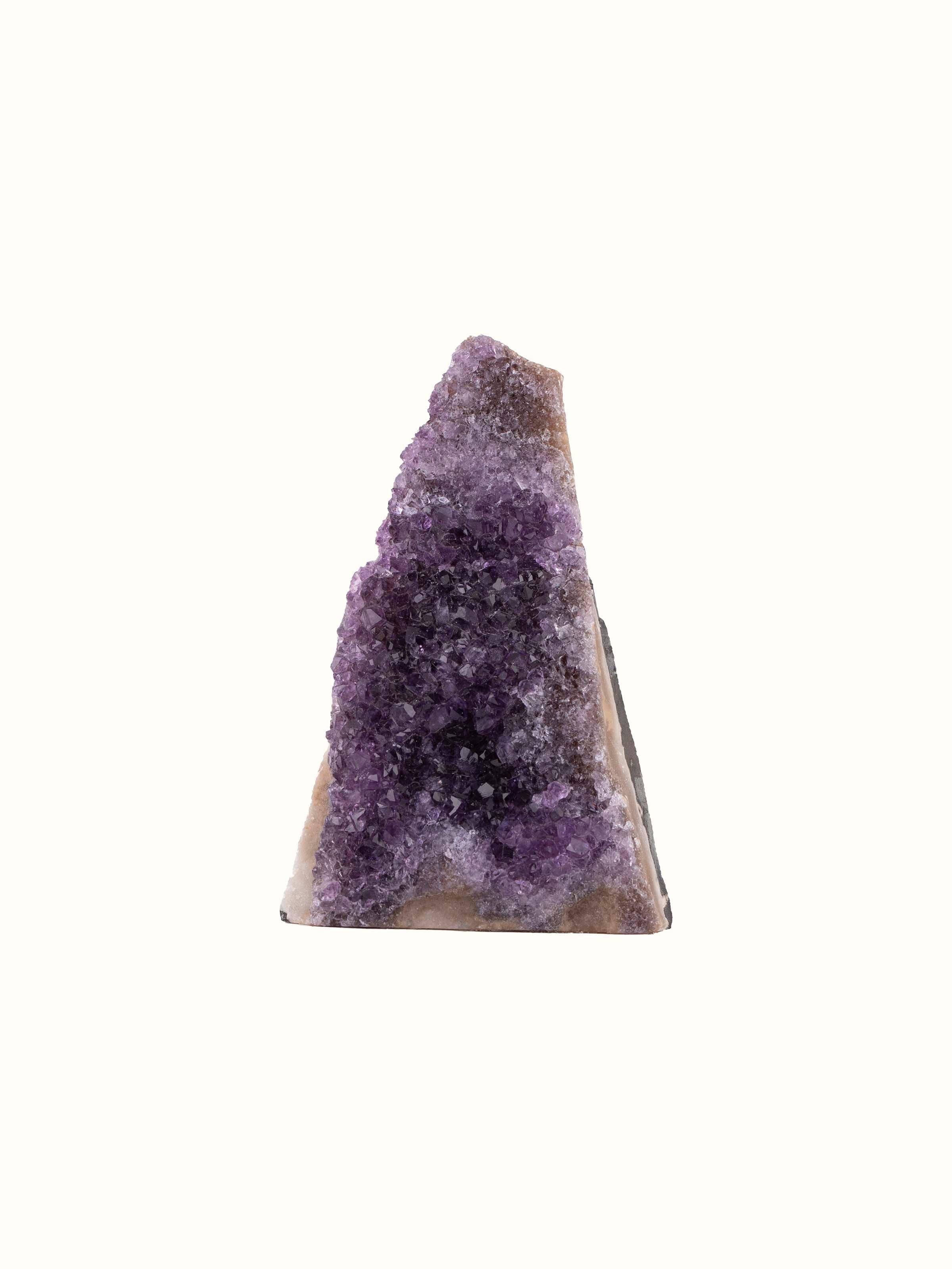 Front view of Medium Amethyst Geode showcasing its vibrant purple crystals and natural geode structure