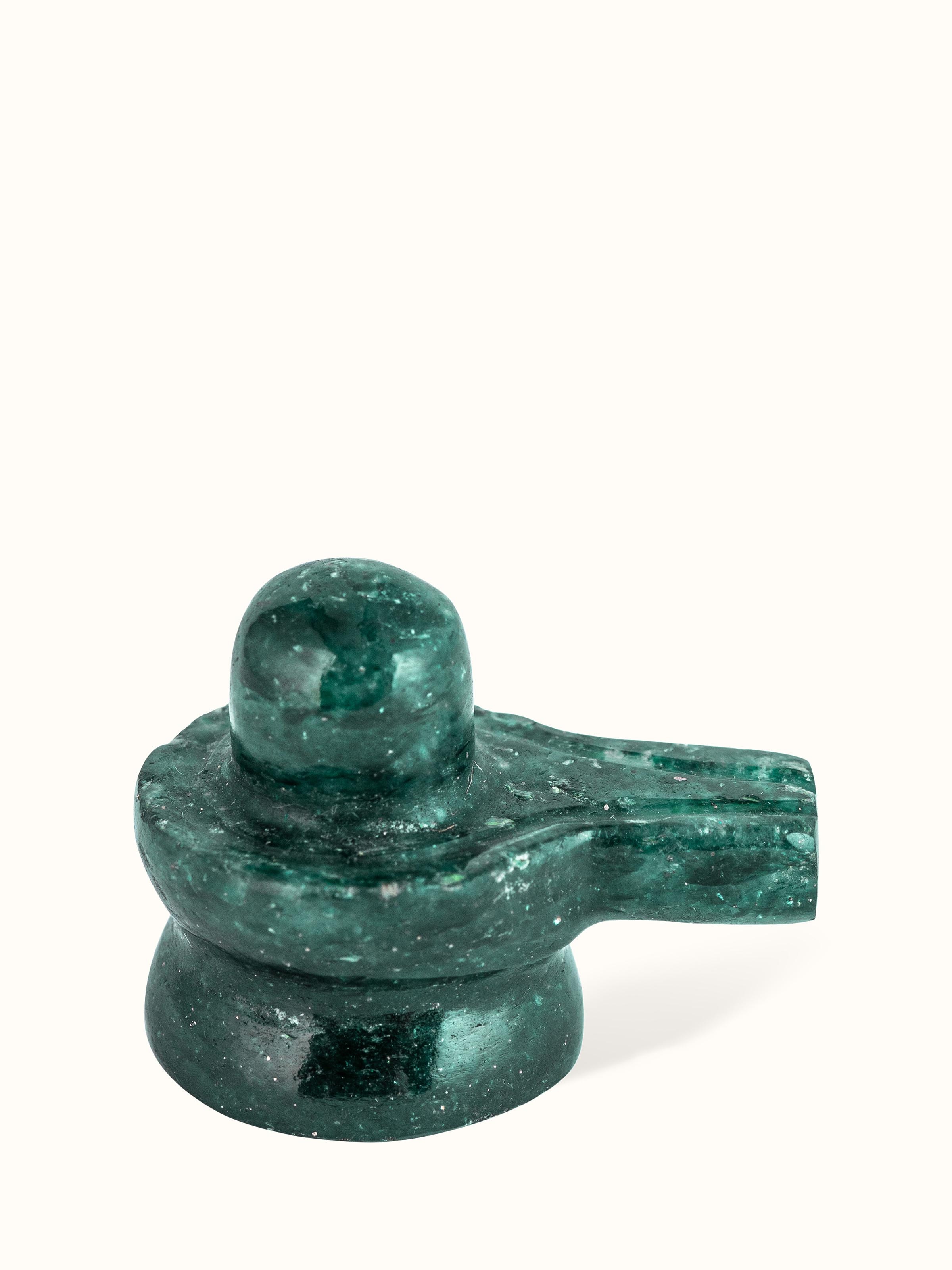 Front view of Swadesh Small Jade Shivling, highlighting its smooth finish and vibrant green color, ideal for spiritual practices.