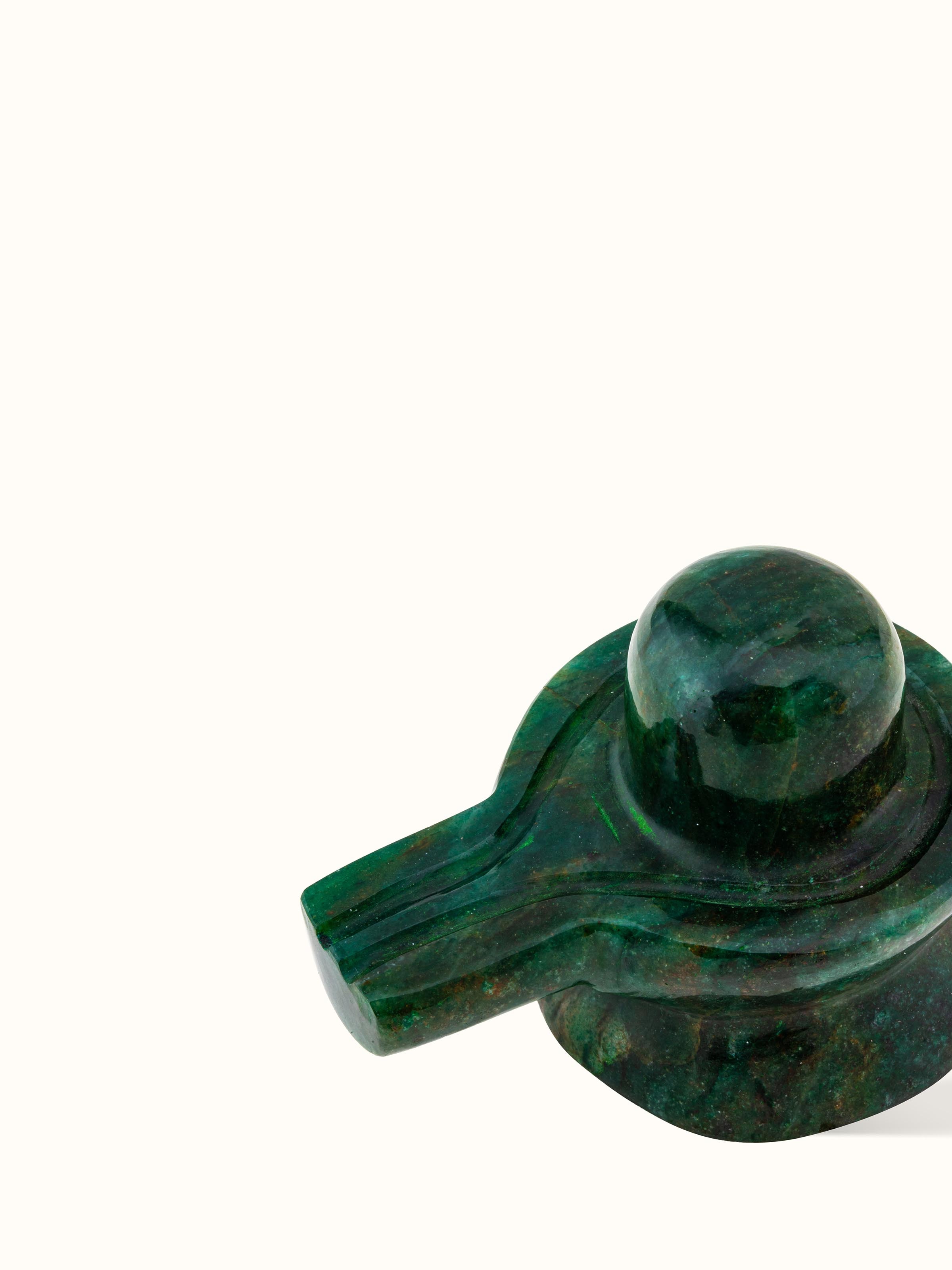 Top view of Jade Shivling (Medium) showing the overall shape and natural color variations of the jade.