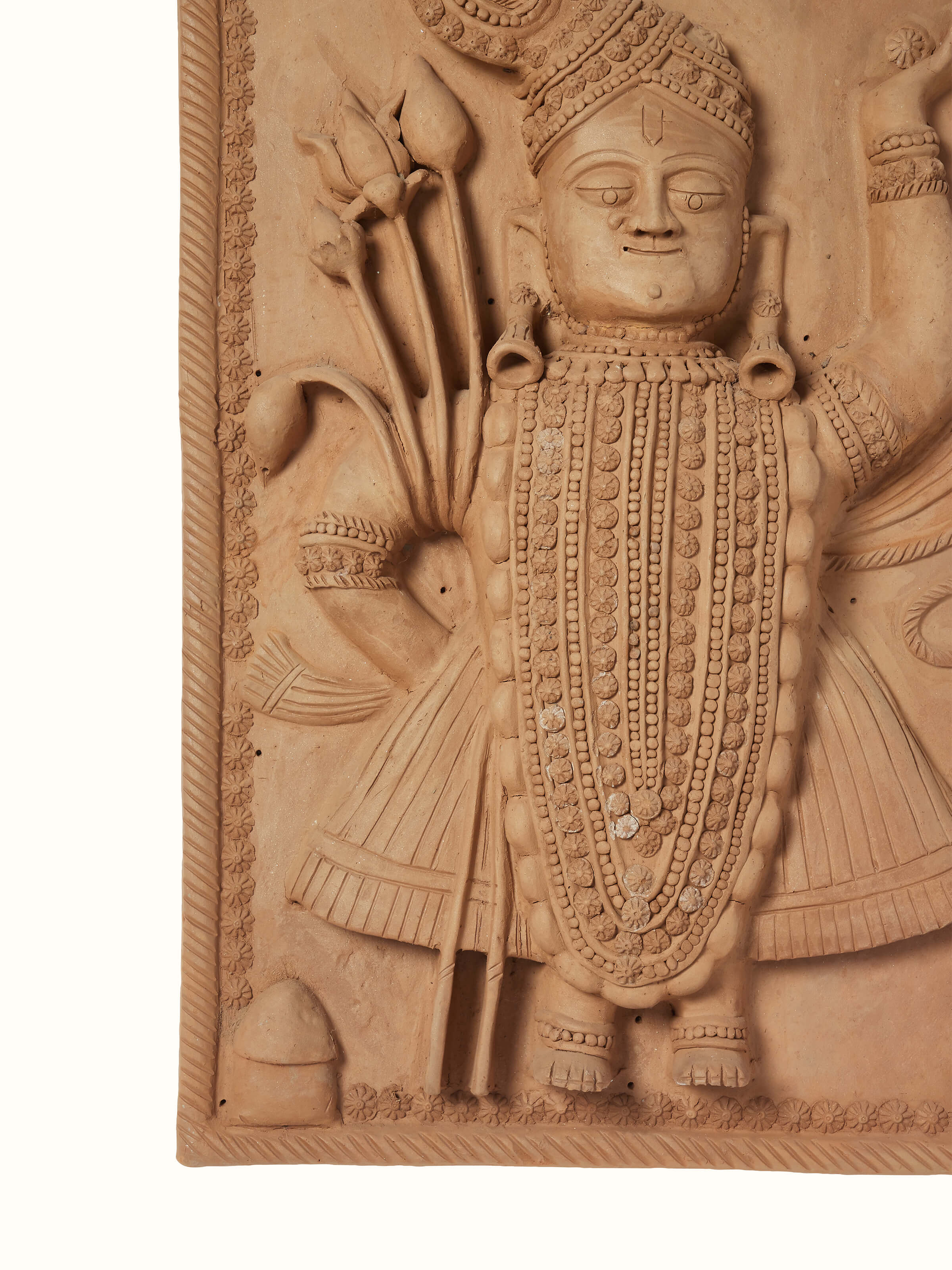 Side view of Terracotta clay Shreenath ji idol showcasing the detailed craftsmanship and elegant design