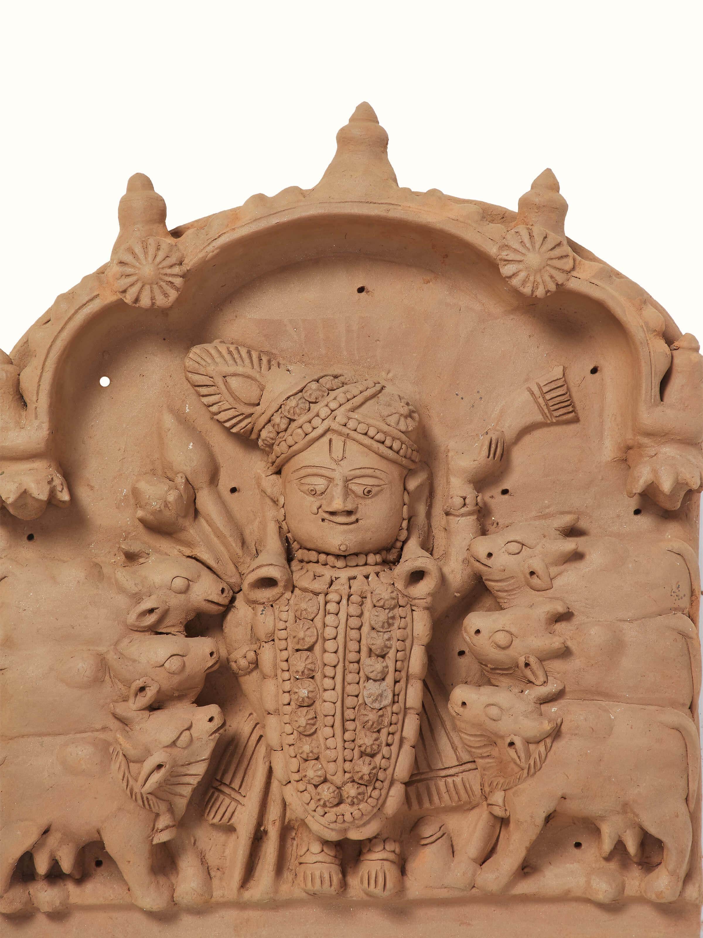 Detailed view of Terracotta clay Shreenath ji with cows idol highlighting intricate design