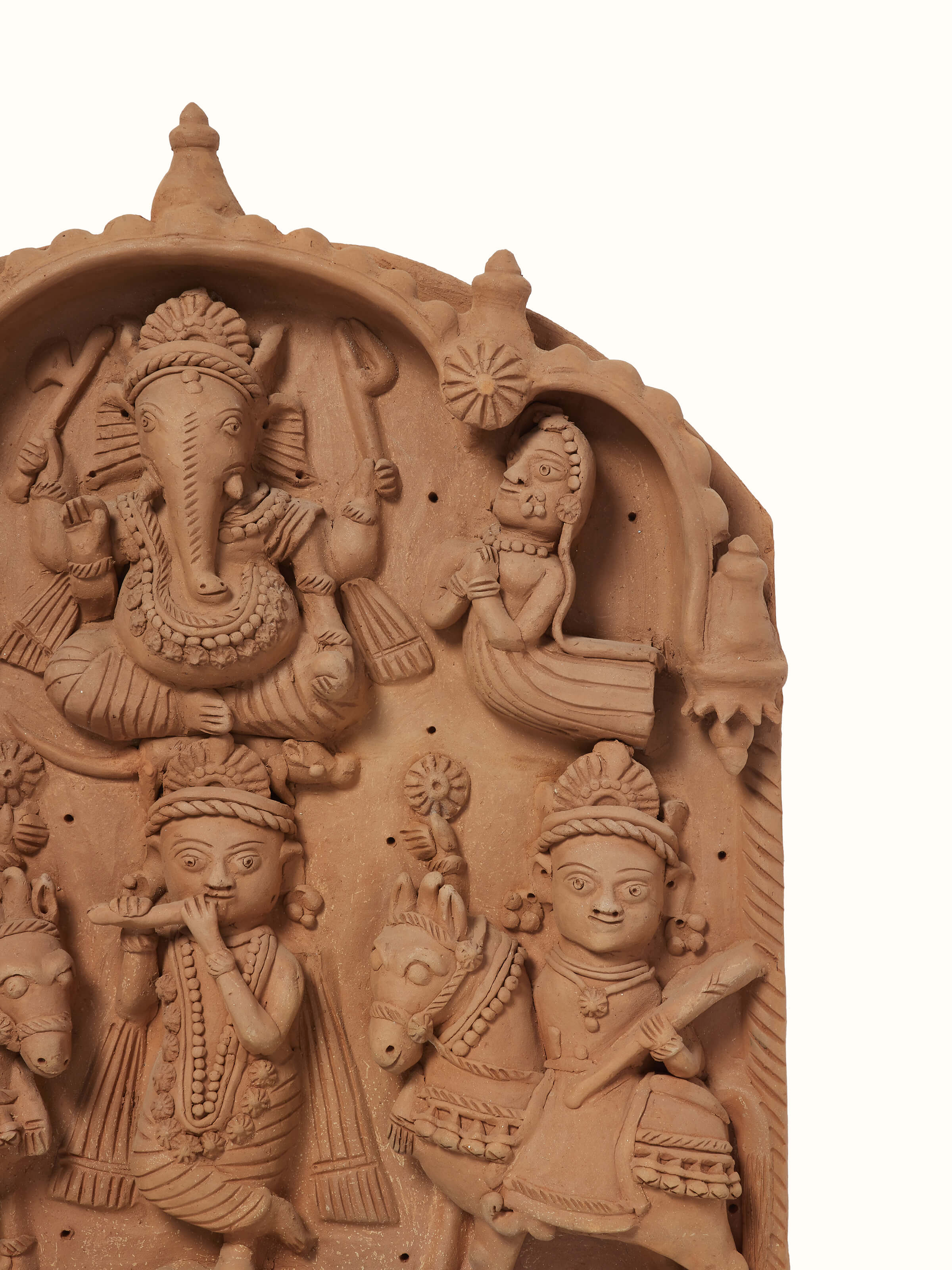 Side view of Terracotta Clay Ganesha Idol highlighting its detailed craftsmanship and finish.