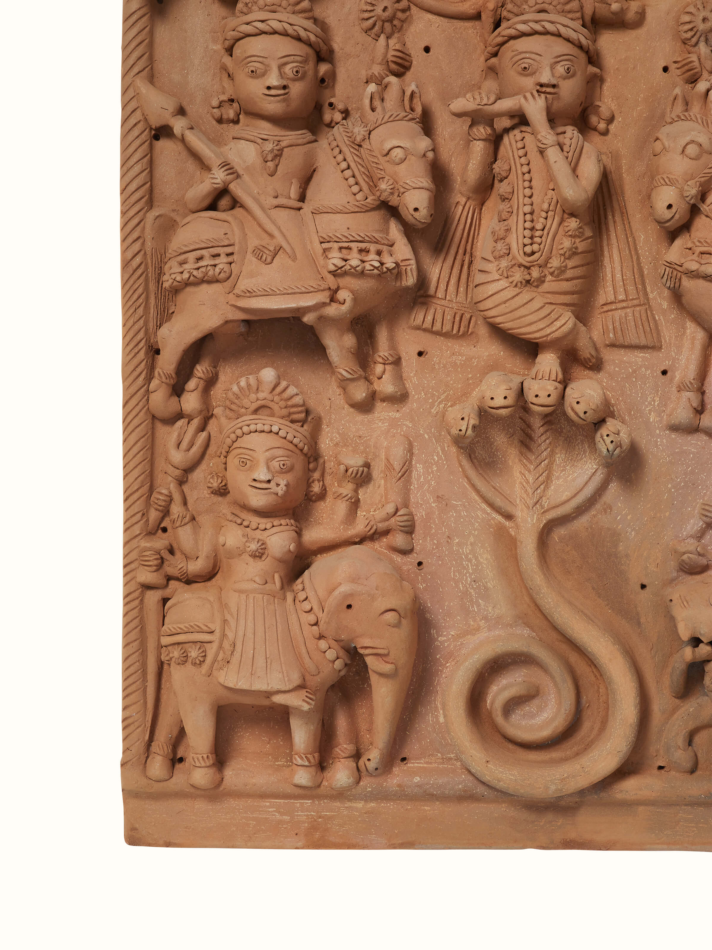 Close-up of Terracotta Clay Ganesha Idol focusing on its fine details and artistic elements.