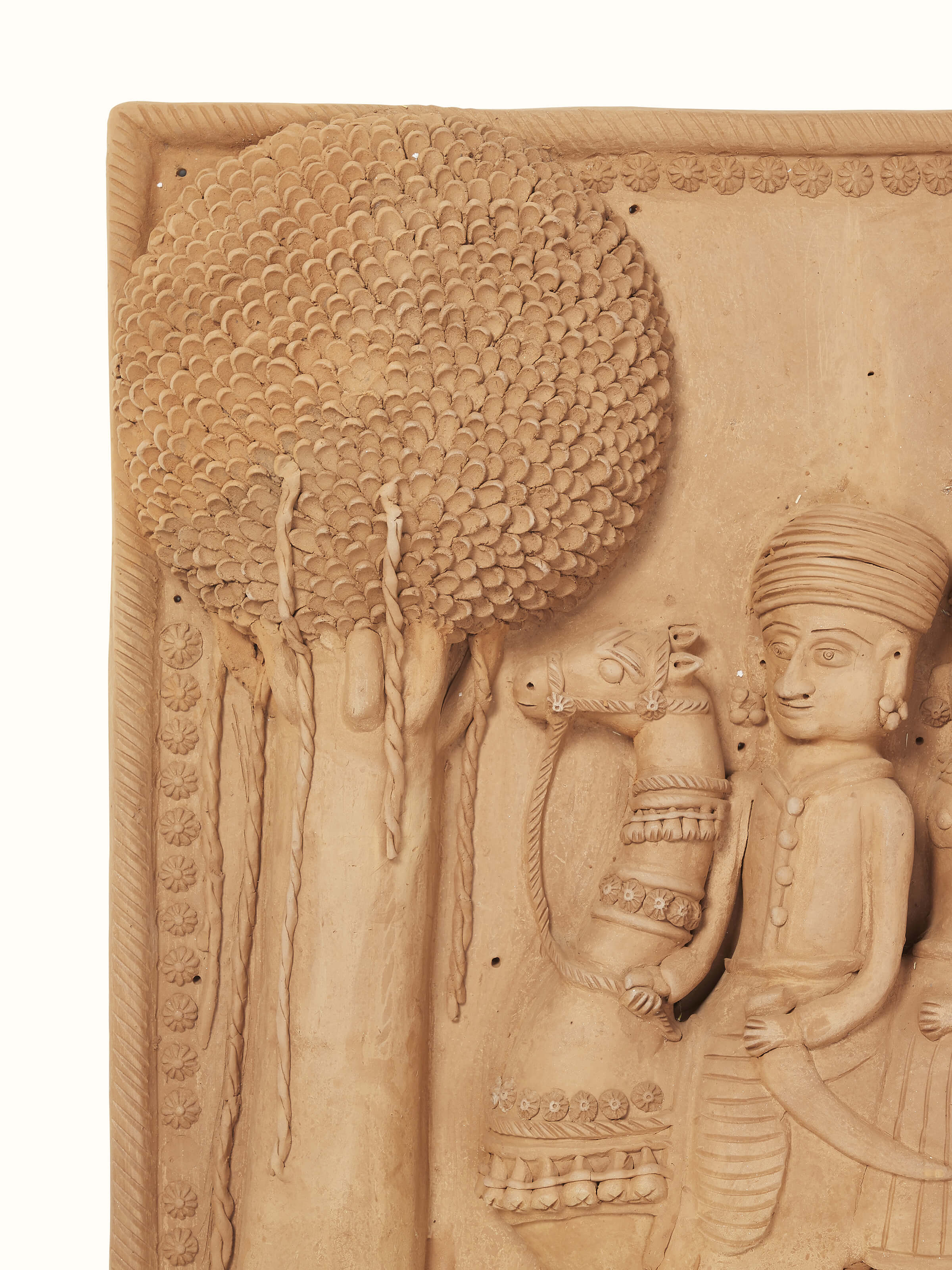 Side view of Terracotta clay Dhola Maru sculpture highlighting its traditional design