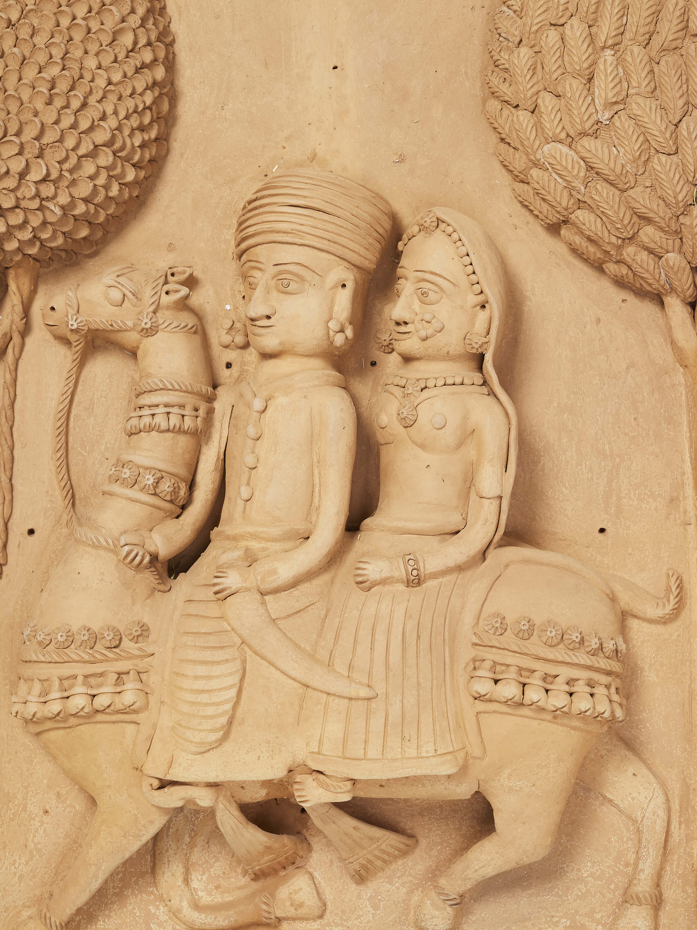 Close-up view of Terracotta clay Dhola Maru sculpture showcasing intricate details