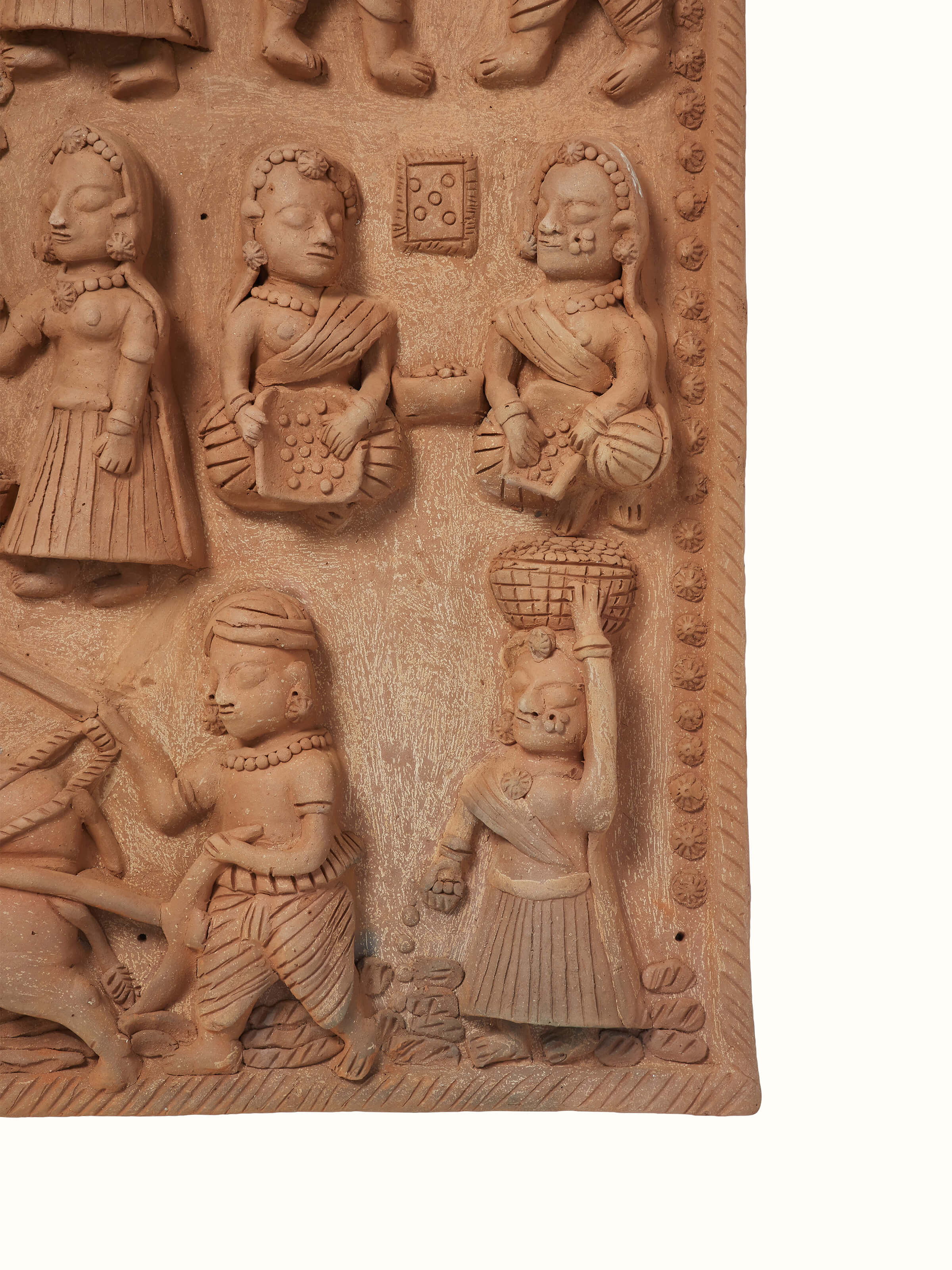 Back view of terracotta clay village scene sculpture highlighting fine artistic details