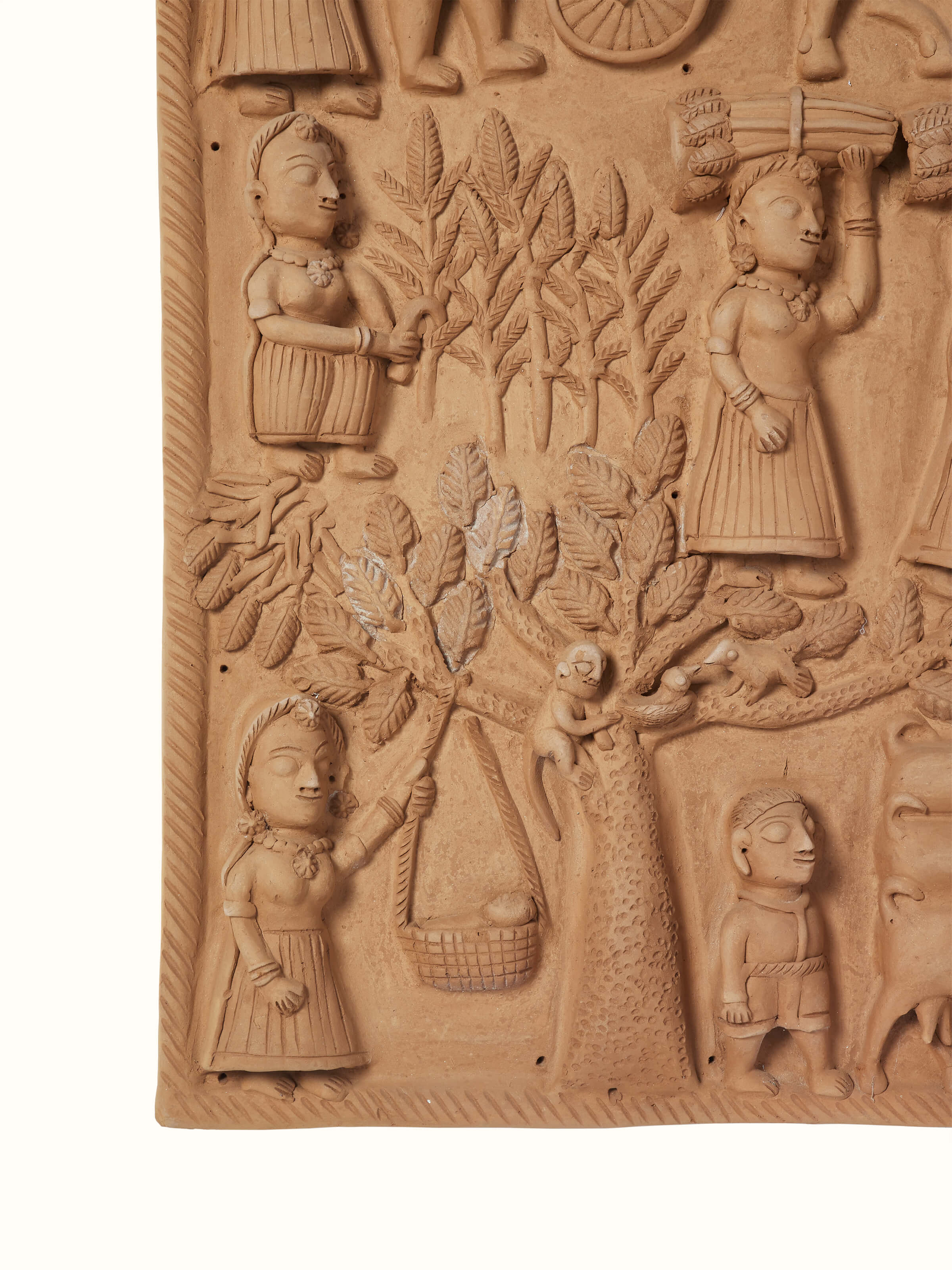 Side view of Terracotta Clay Village Scene Sculpture highlighting intricate design elements.