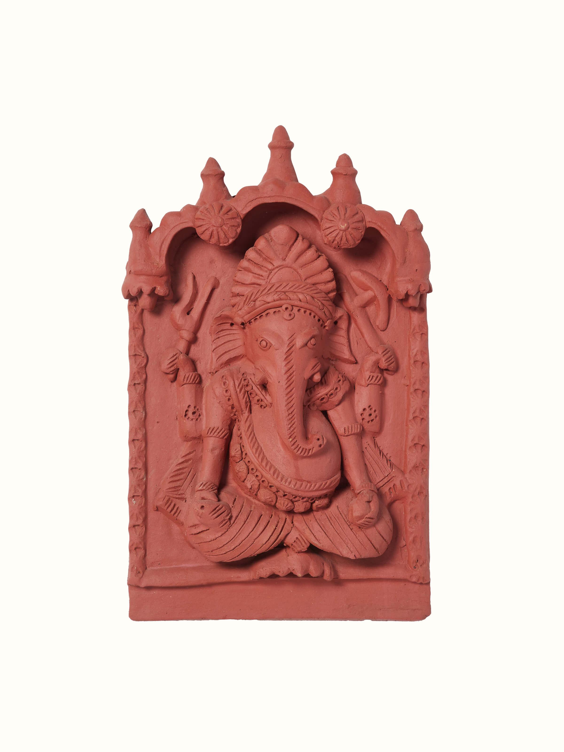Front view of matte terracotta clay Ganesha idol, highlighting the smooth finish and detailed features of the sculpture.