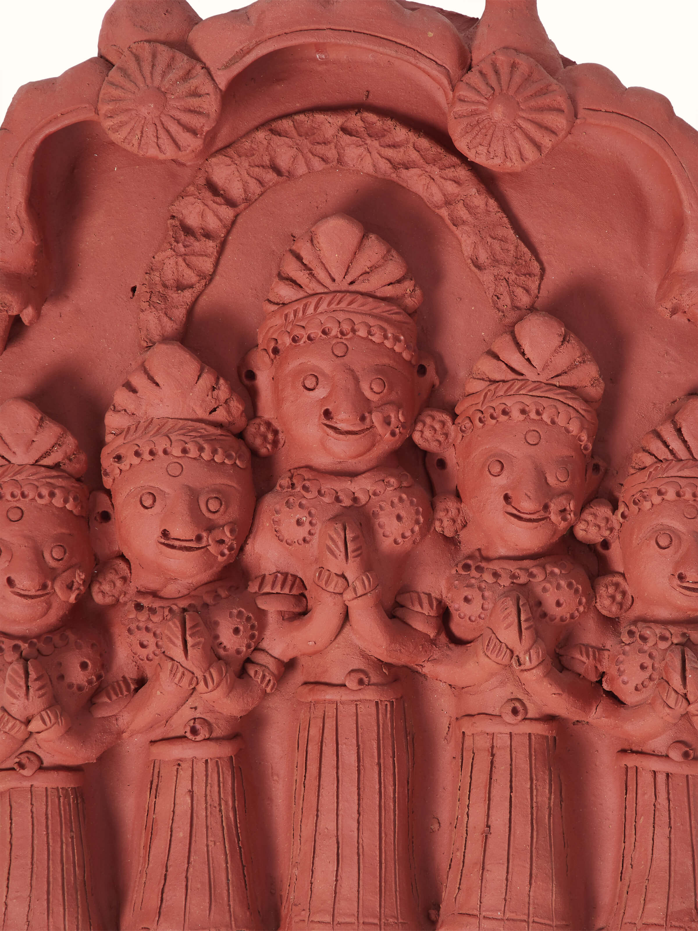 Detailed view of terracotta clay five lords sculpture, emphasizing the artistry and craftsmanship.