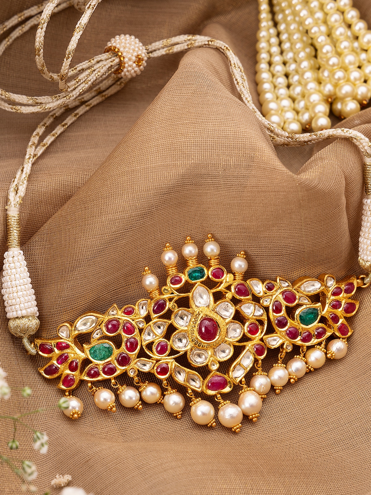 Close-up of Hyderabad Jadau 22 Karat Gold Choker highlighting the intricate design and gemstone accents.