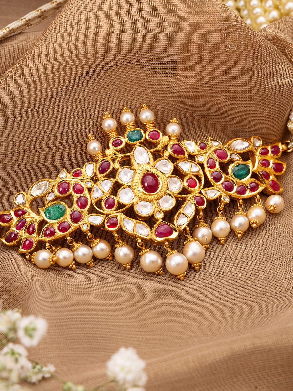 Detailed view of Hyderabad Jadau 22 Karat Gold Choker highlighting the richness of the gold and intricate design.