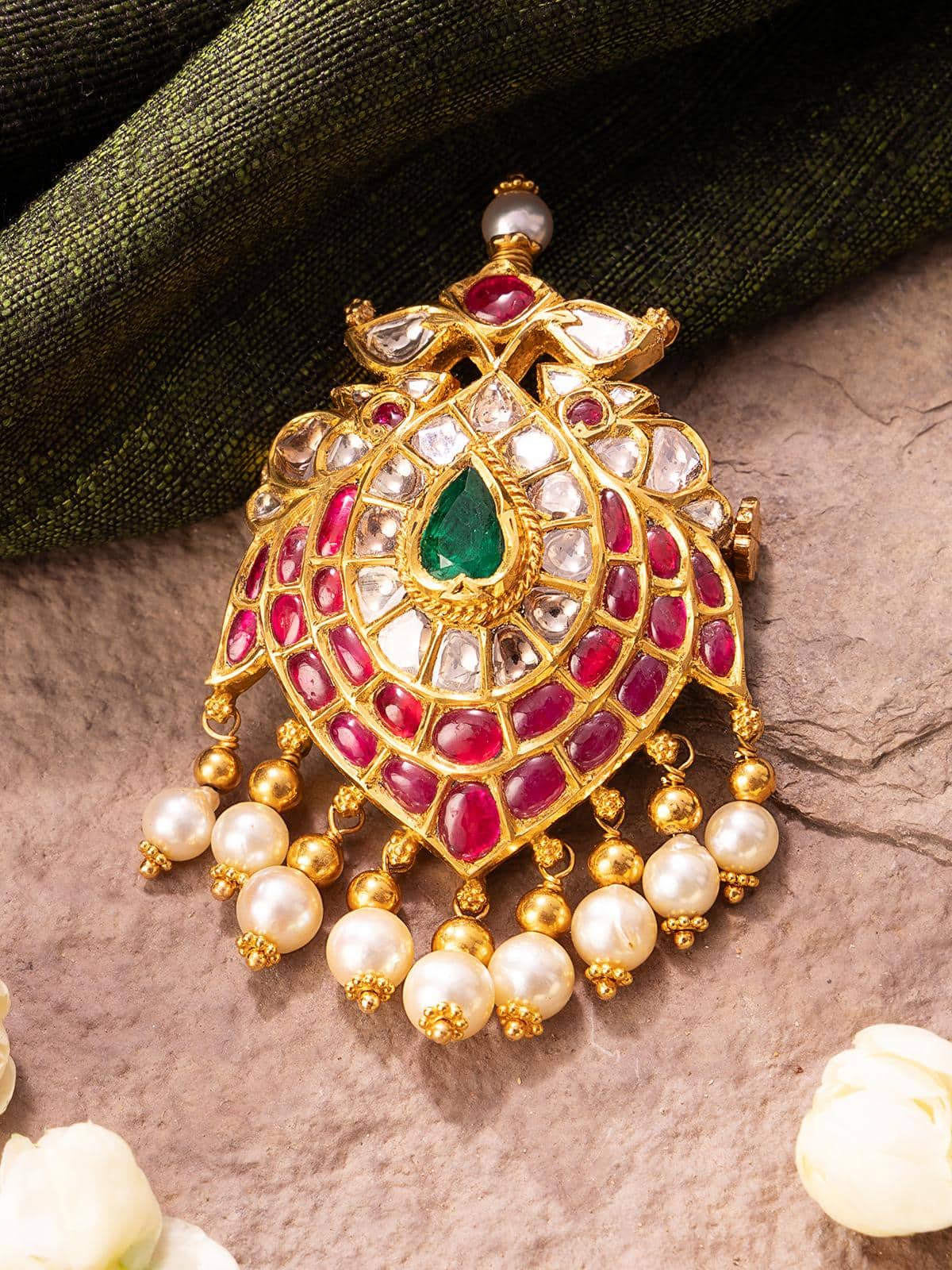 Lifestyle shot of Jadau brooch pin showcasing heritage-inspired look with luxurious detailing