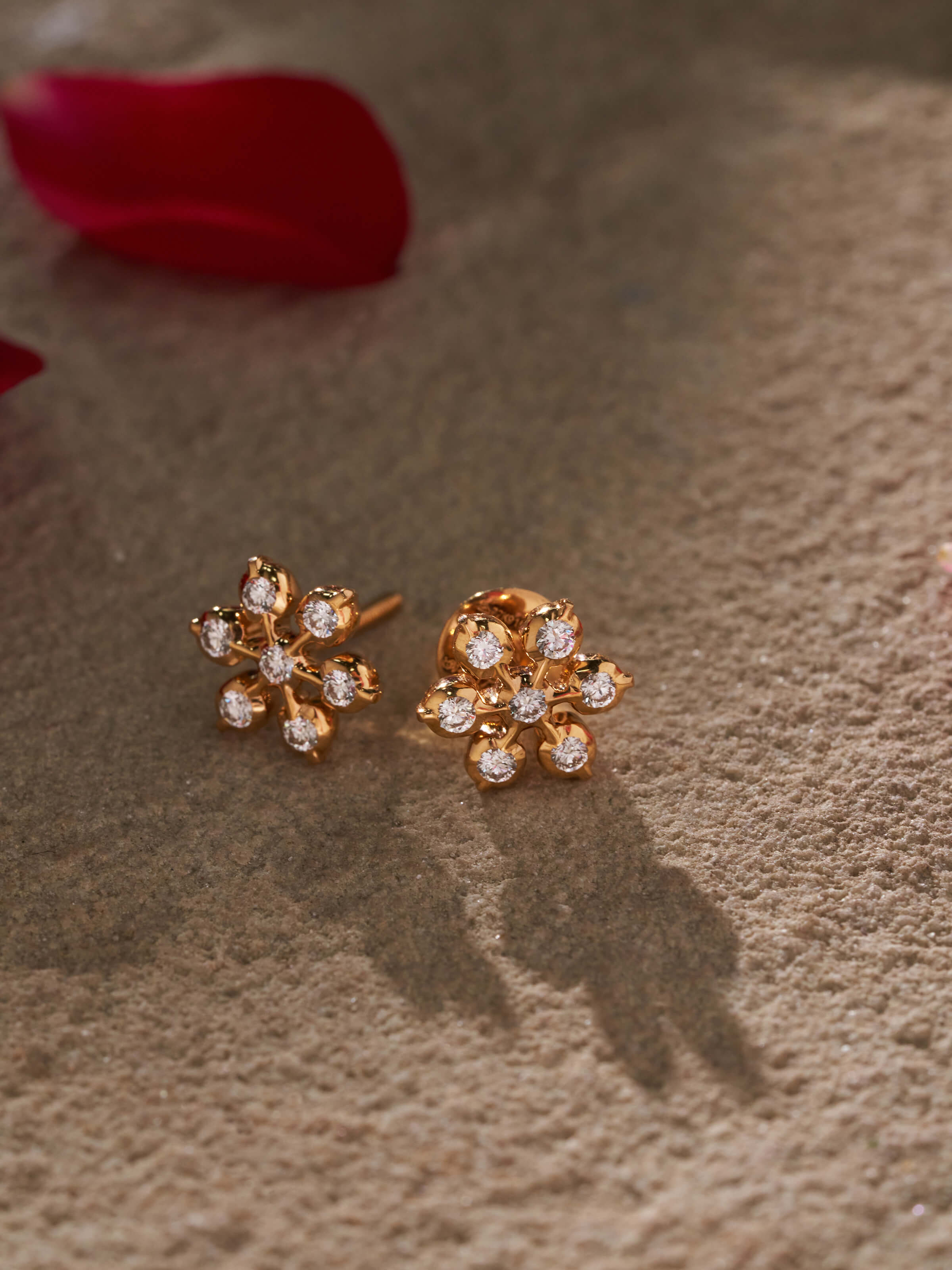 Side view of close-setting 22 karat gold studs showcasing clean lines and elegant simplicity