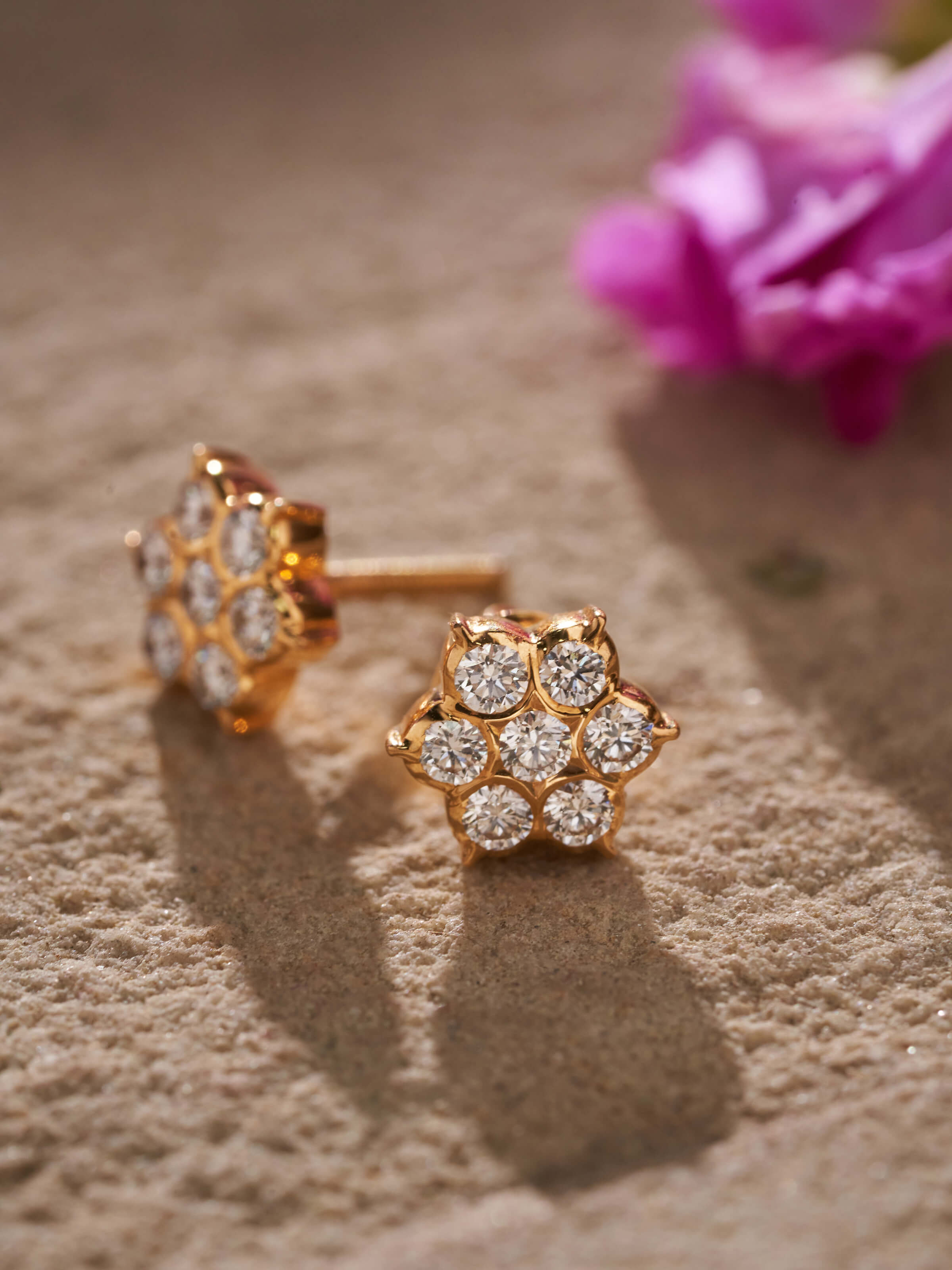 Side profile capturing the detailed close-setting craftsmanship of the gold studs
