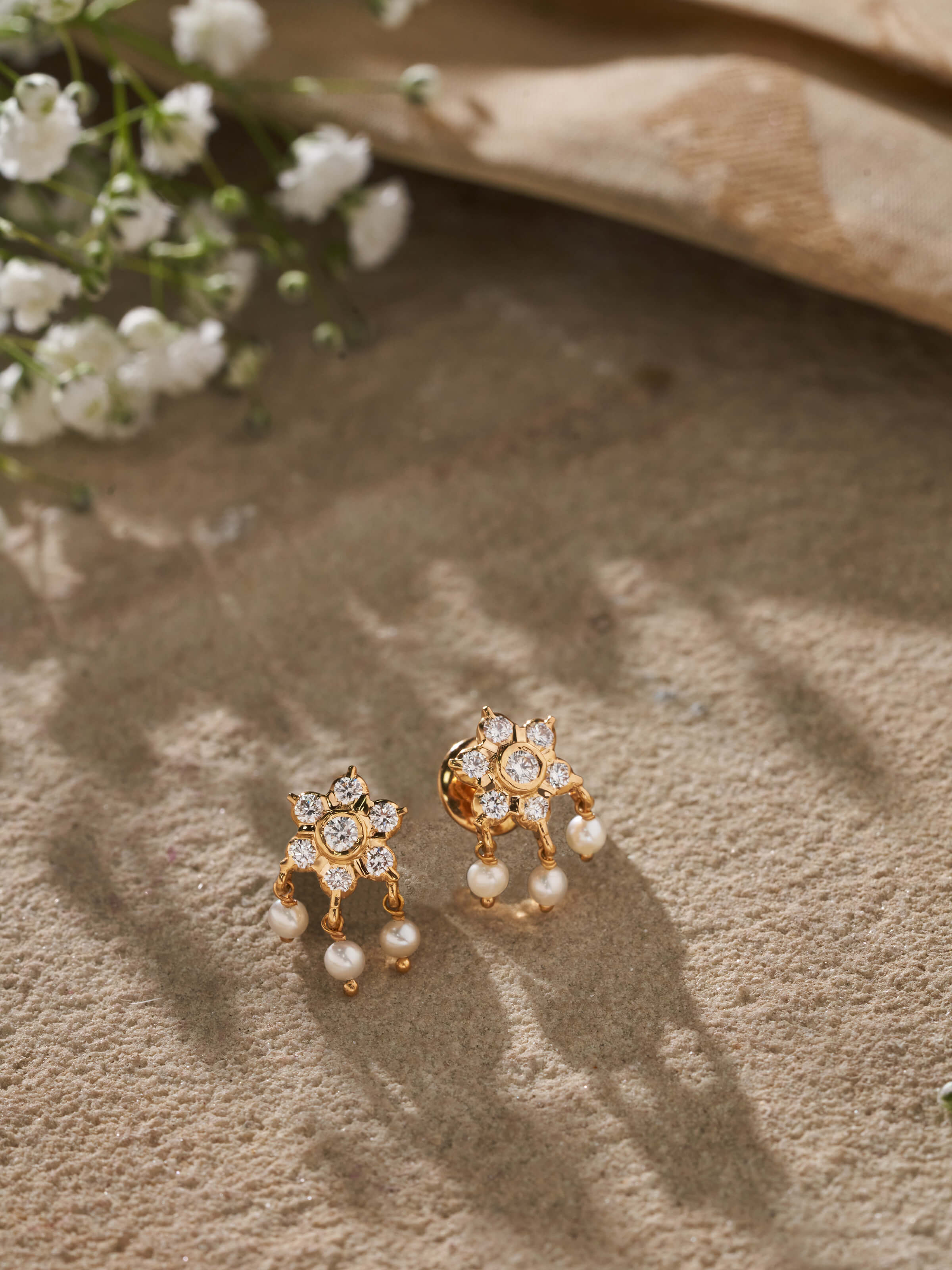 Side view of Close-setting 22 Karat Gold Studs highlighting their refined setting and detailed craftsmanship.