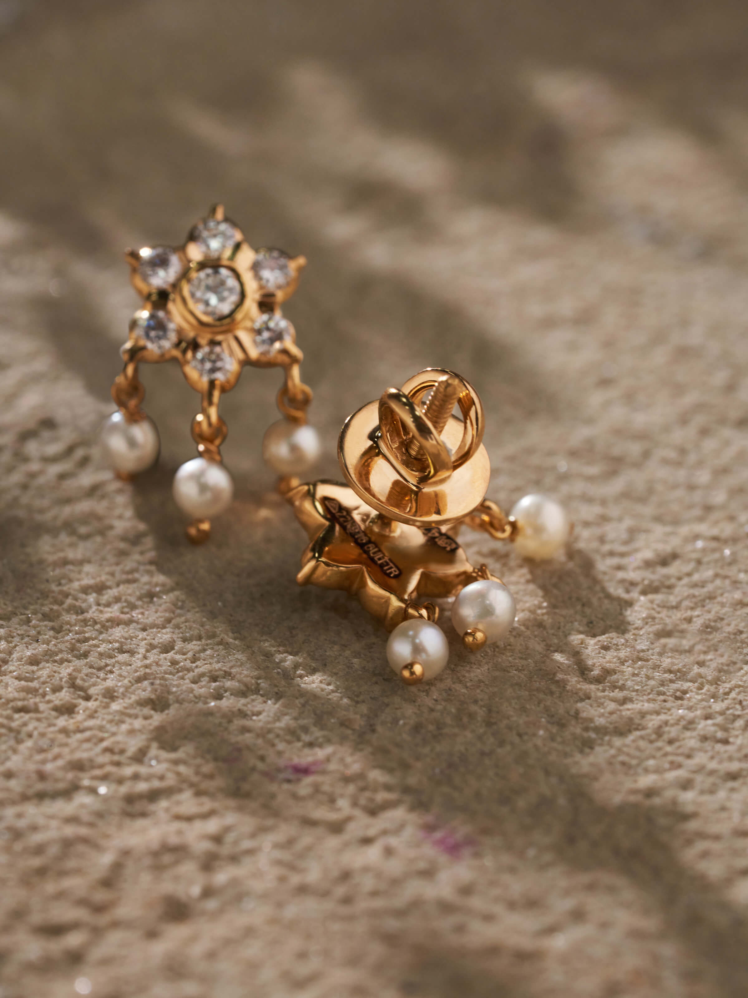 Detailed view of Close-setting 22 Karat Gold Studs emphasizing their refined design and premium quality.