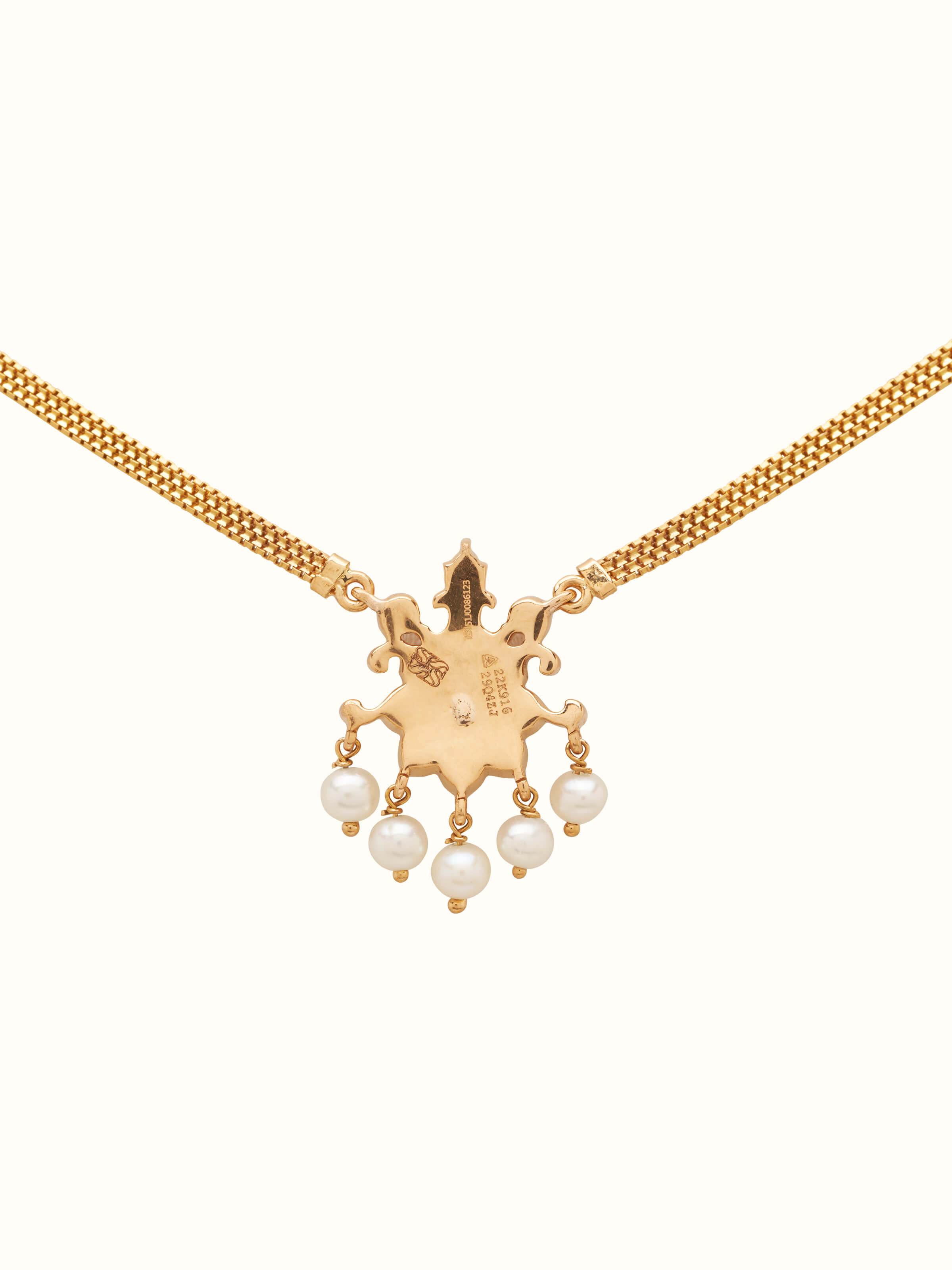 Back view displaying the chain clasp and pendant details