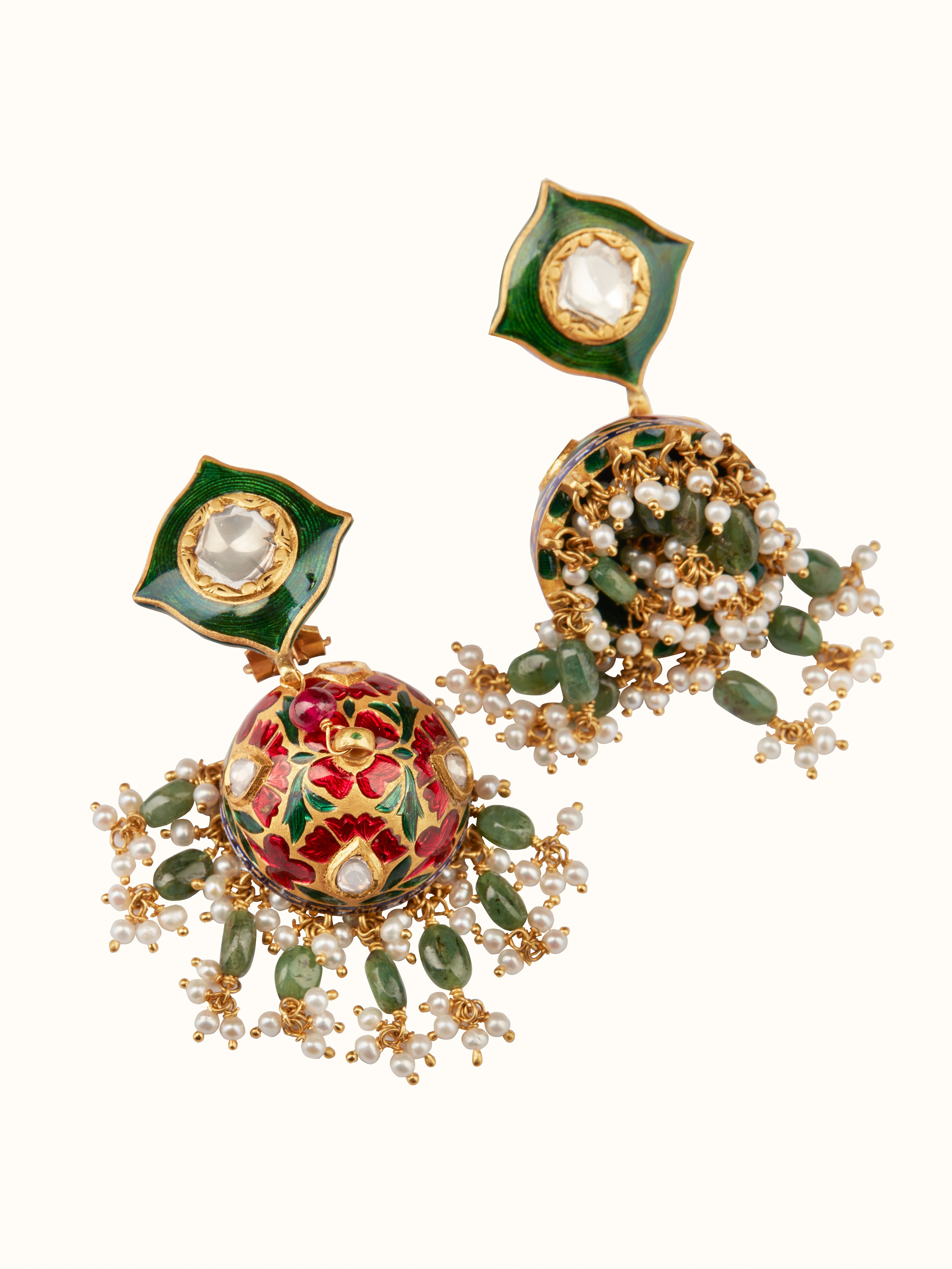 Angled view of Meenakari 22 Karat Gold Jhumkas highlighting their traditional design and gold detailing