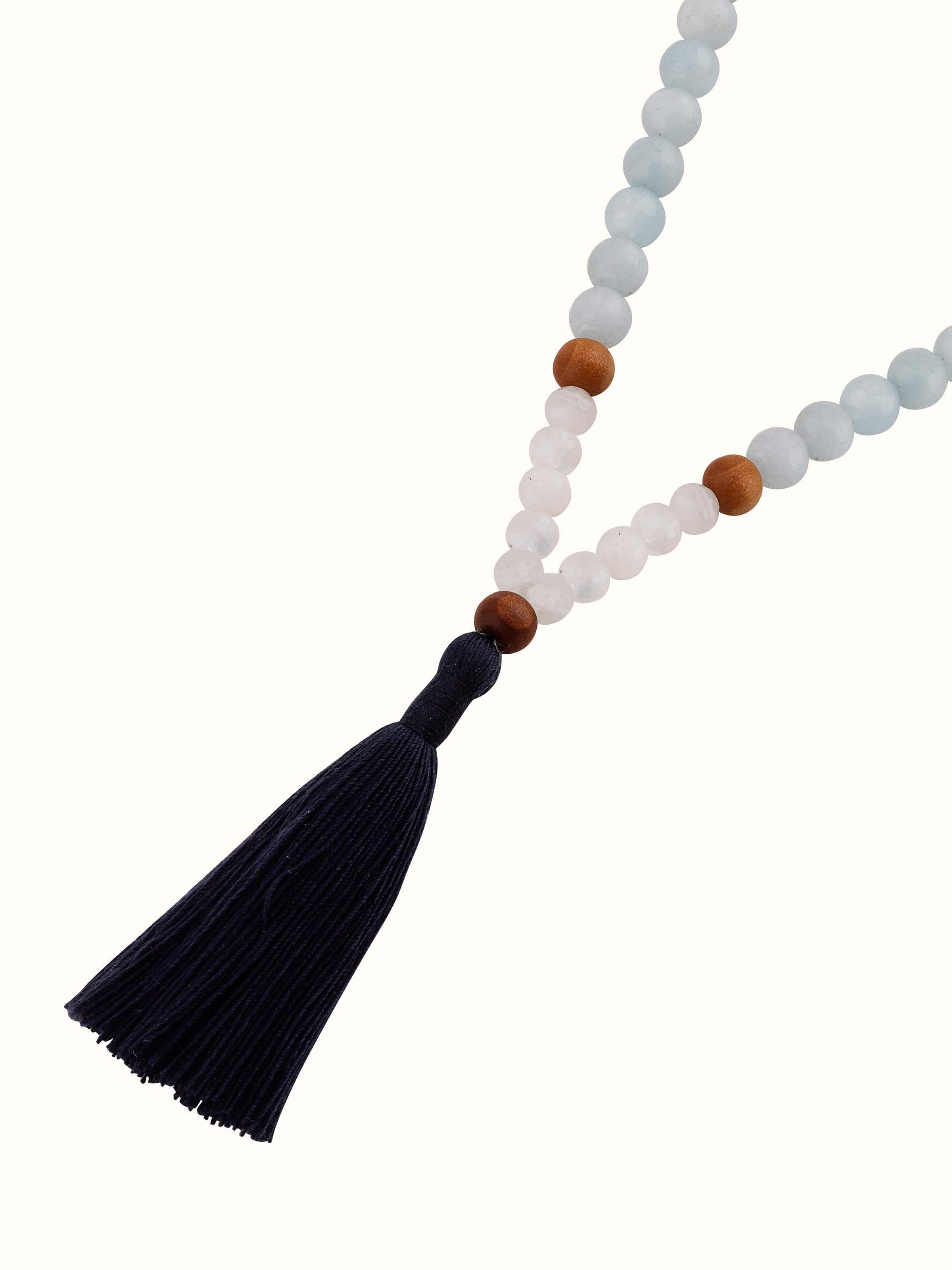 Top view of Lapis Lazuli, Aquamarine & White Moonstone Mala showcasing the layout and arrangement of the beads.