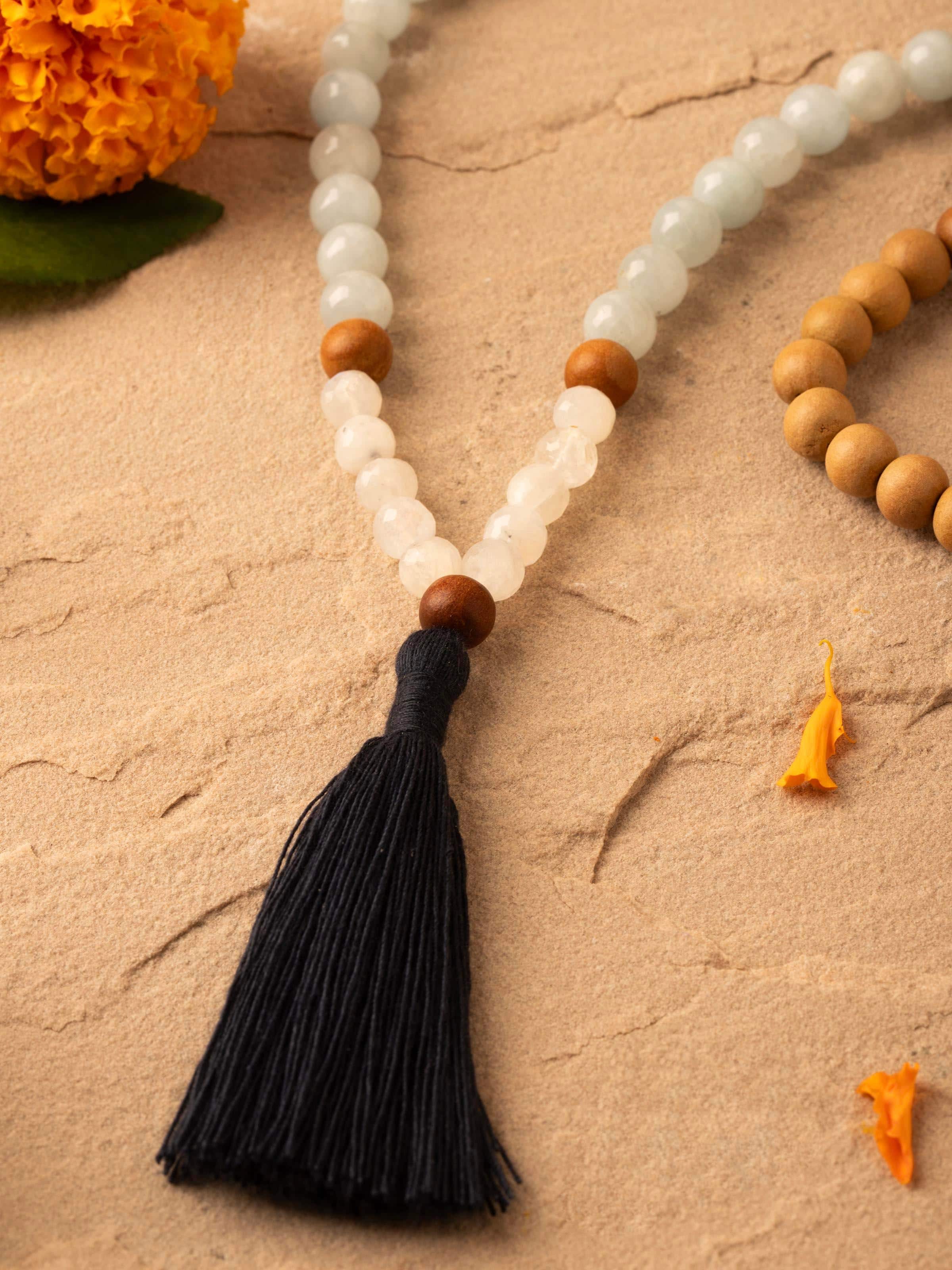 Back view of Lapis Lazuli, Aquamarine & White Moonstone Mala displaying the clasp and securing mechanism.