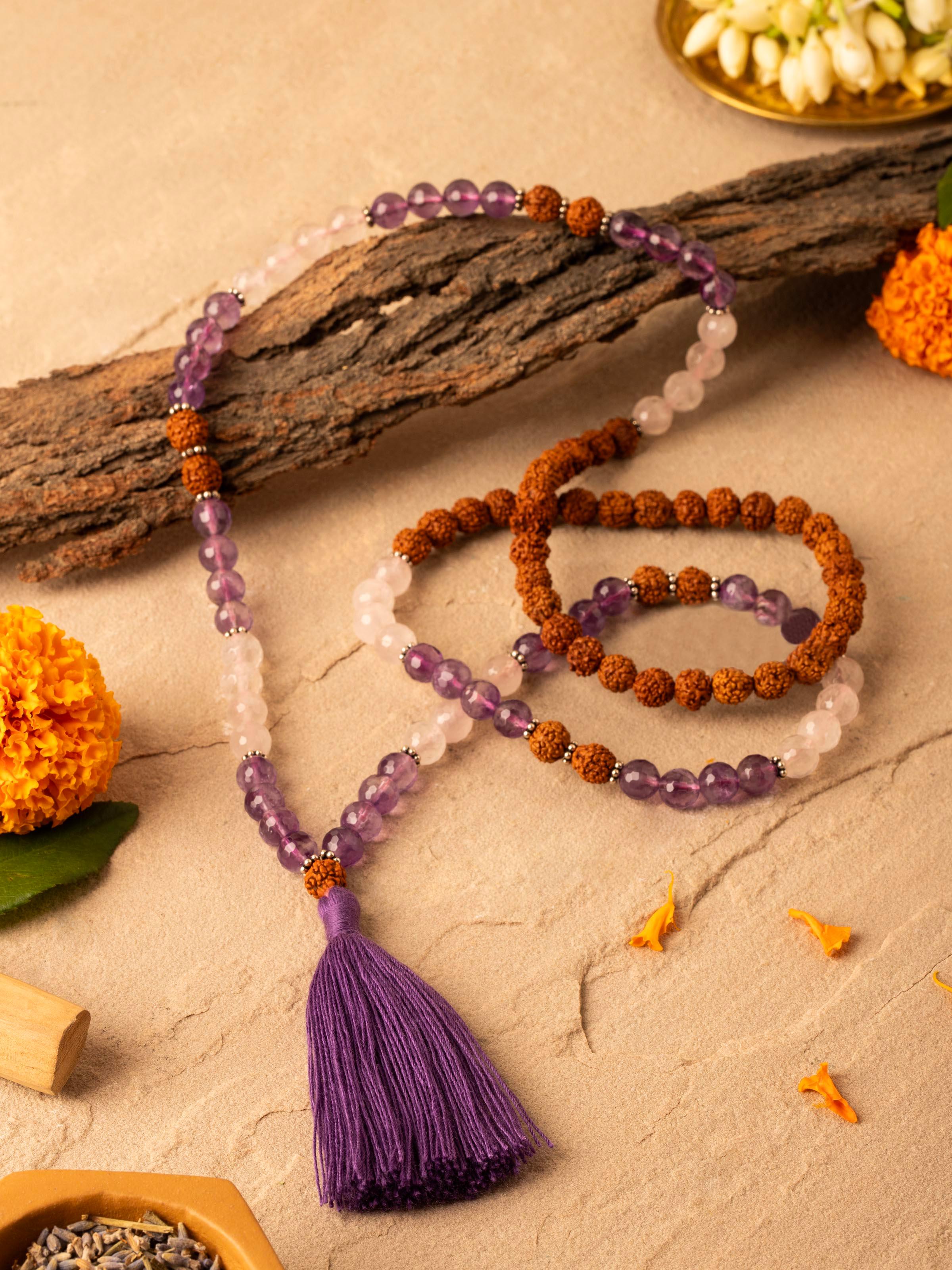 Side view of Amethyst, Rose Quartz & Rudraksha Silver Mala highlighting the detailed craftsmanship of the mala.