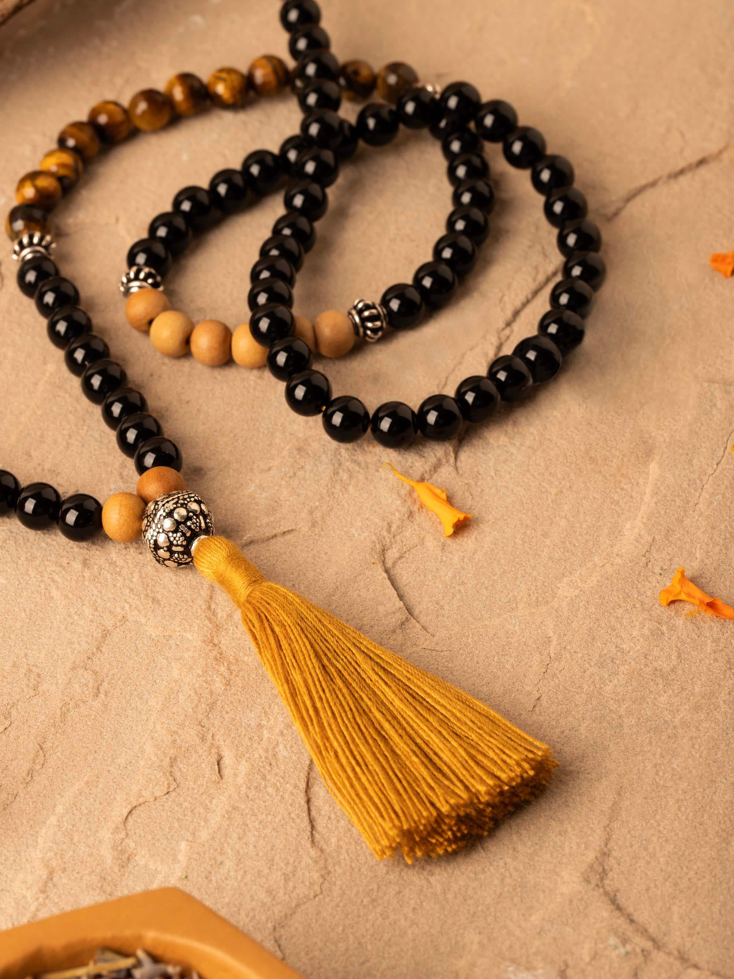 Back view of Tiger Eye & Black Onyx Silver Mala displaying the clasp and how the mala is secured.