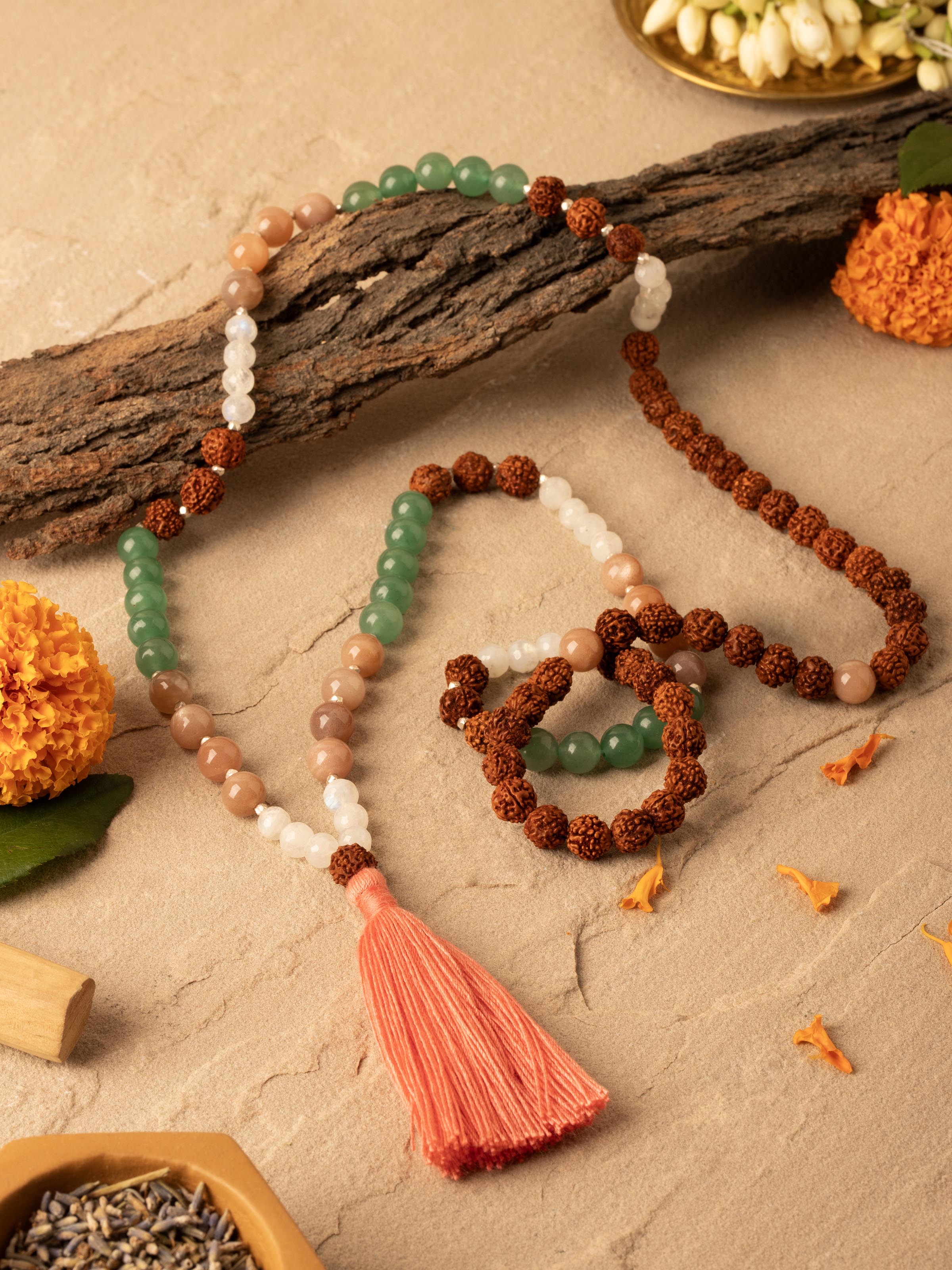 Close-up view of Peach & White Moonstone, Green Aventurine & Rudraksha Silver Mala highlighting the beads and silver accents.
