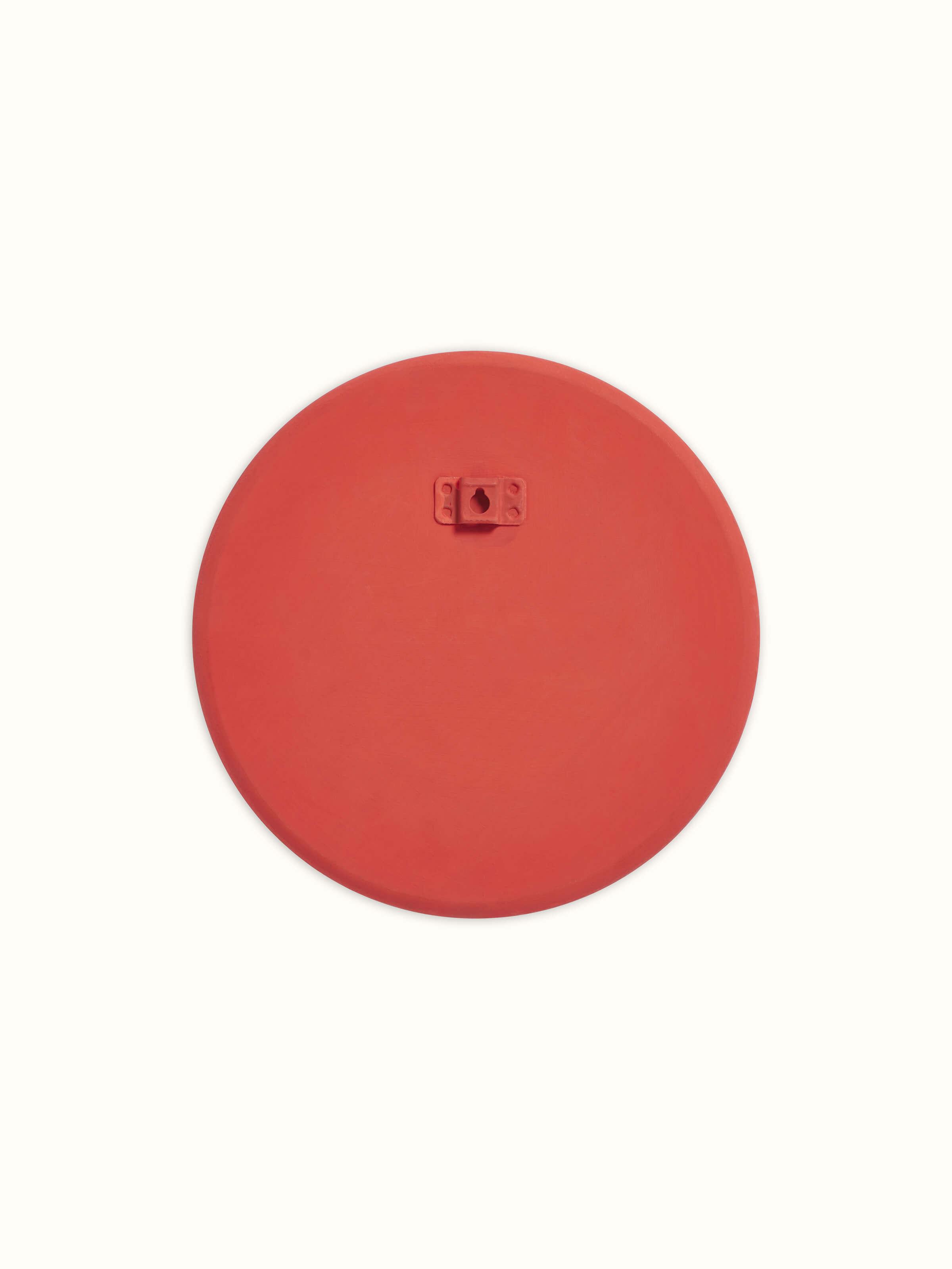Side angle of Cheriyal Hanuman display plate with vibrant colors