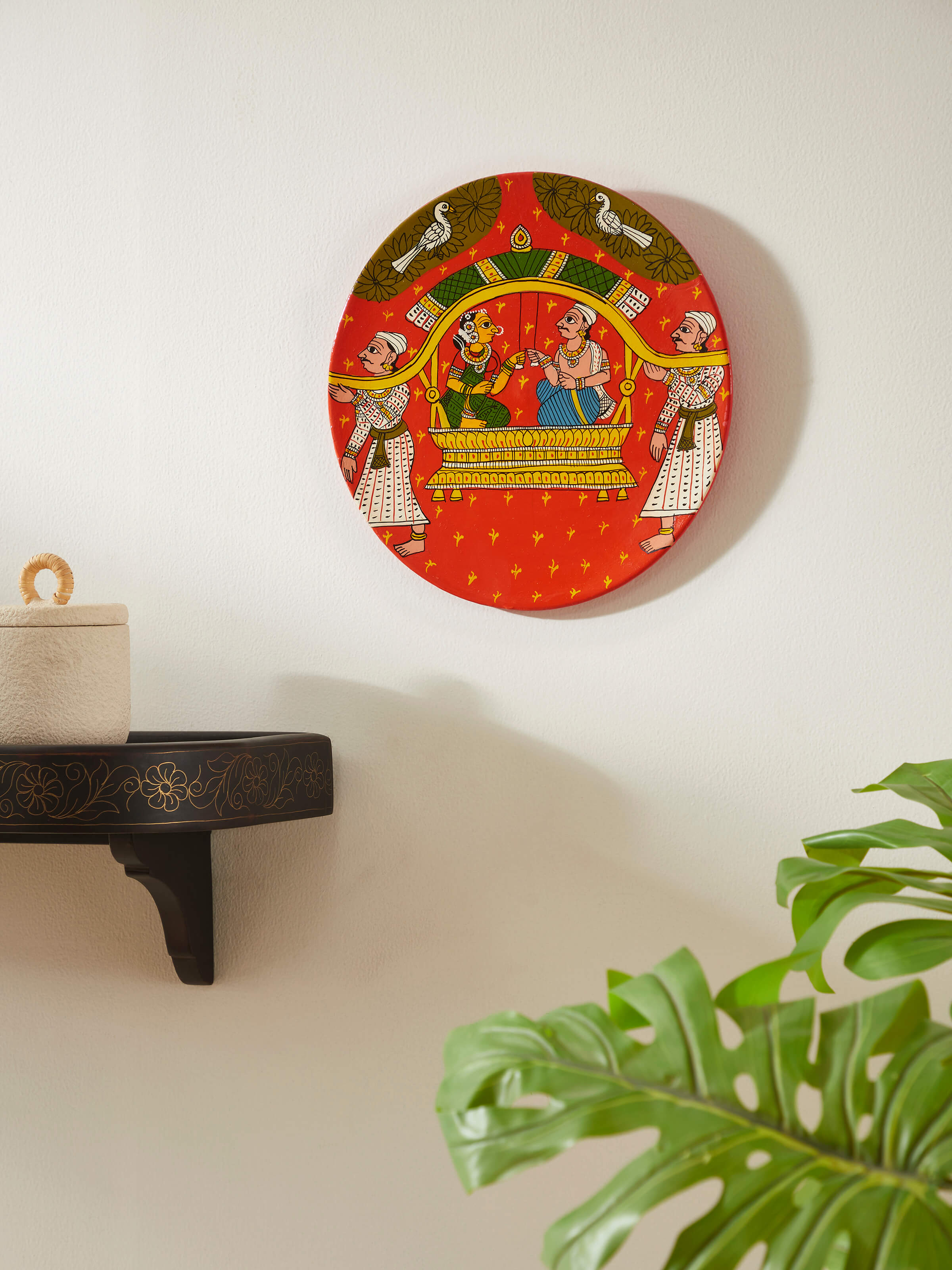 Close-up of Cheriyal palkhi display plate, showcasing detailed traditional artwork and vibrant hues, Swadesh