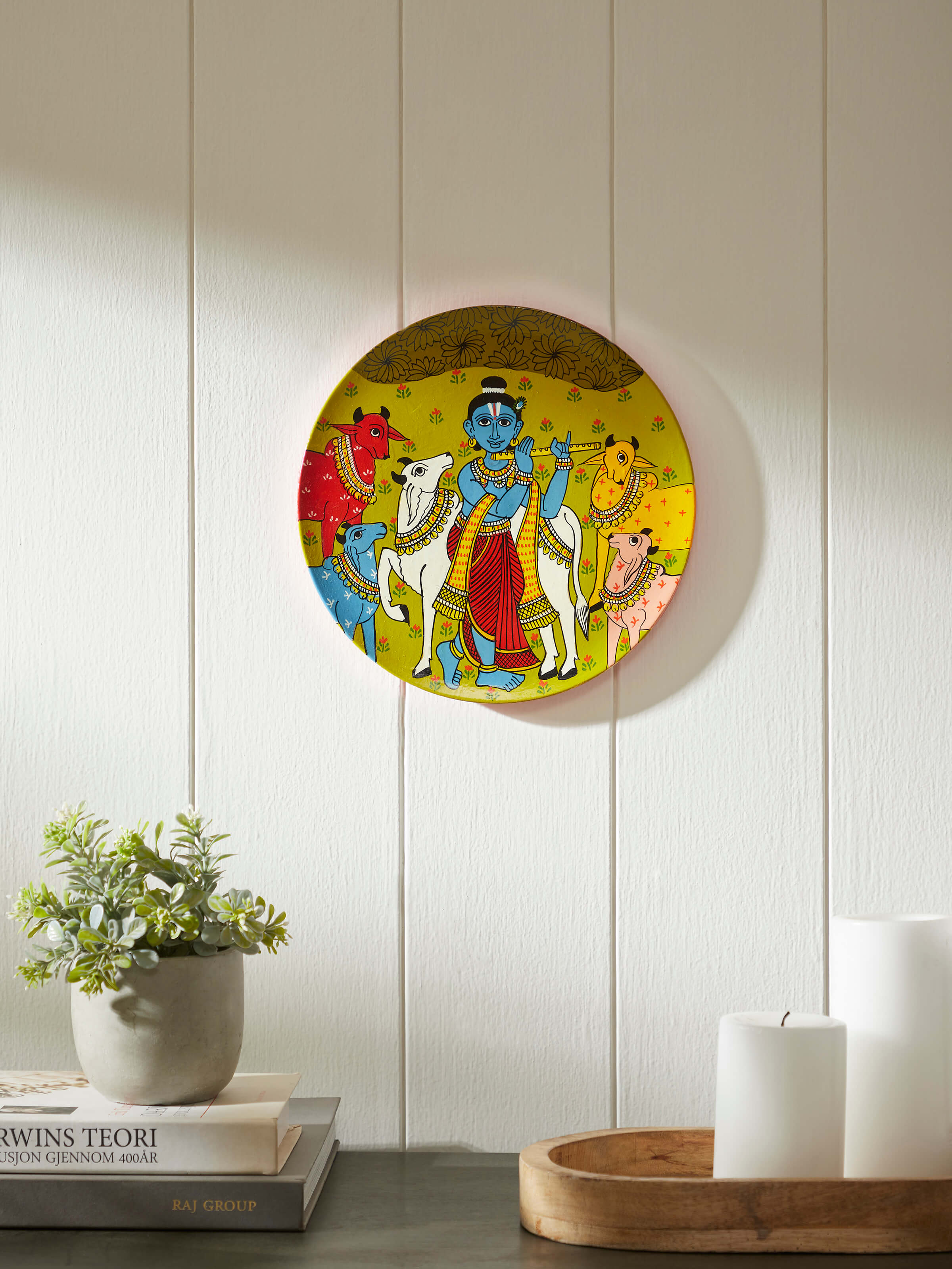 Side view of Cheriyal Krishna Display Plate, highlighting the detailed design and plate shape
