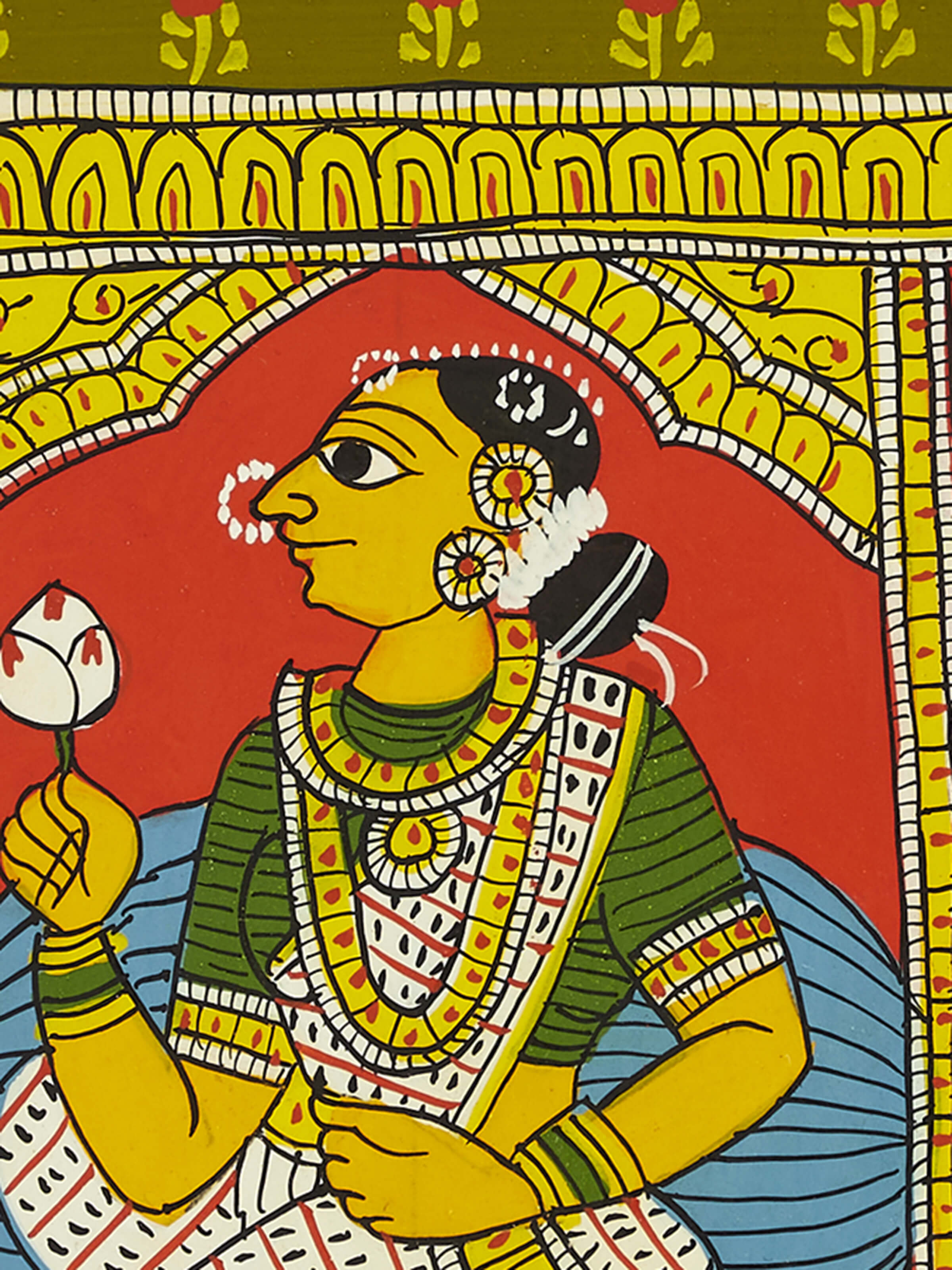 Close-up view of Cheriyal lady display plate, focusing on the intricate designs.