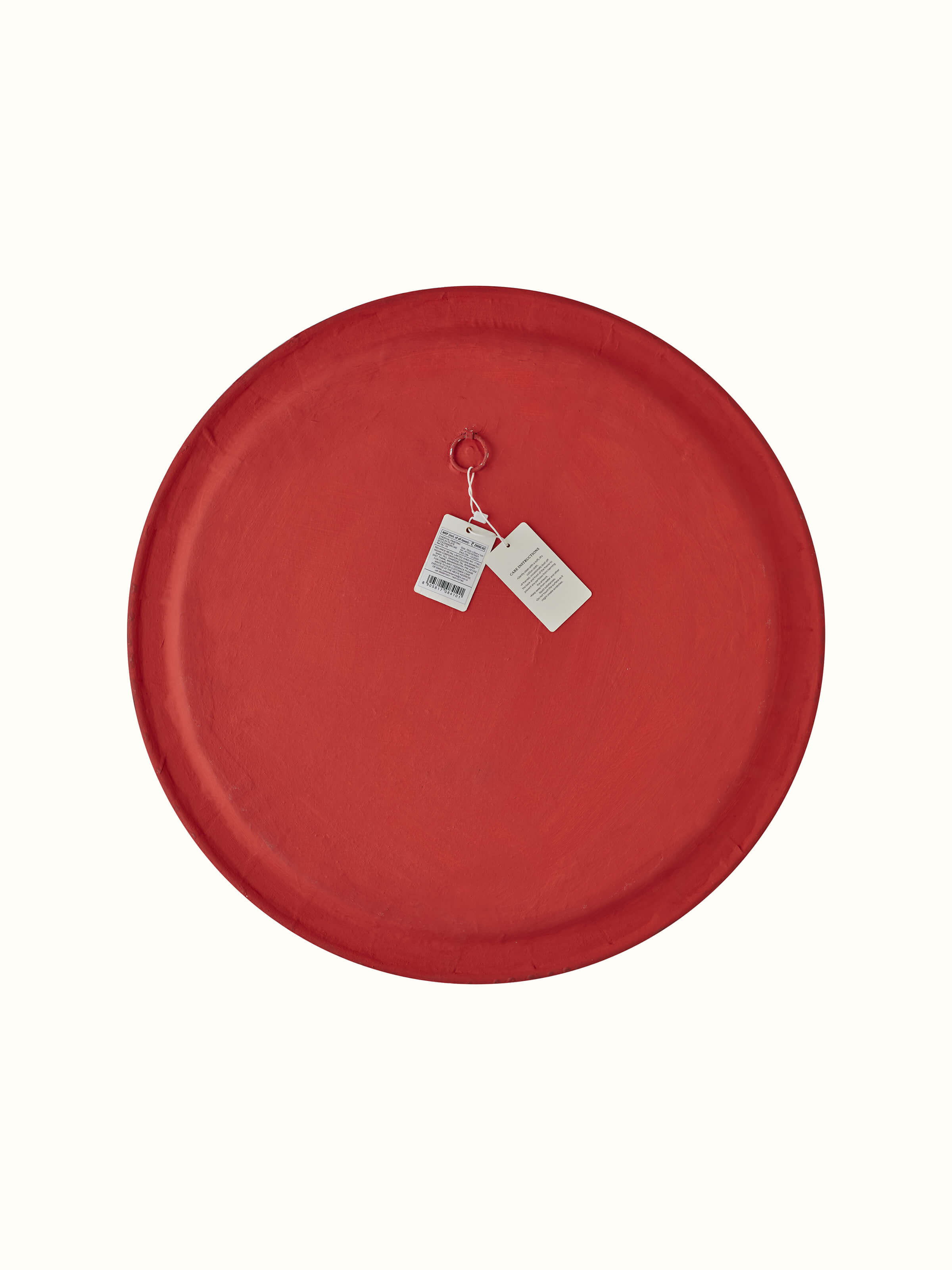 Side view of Cheriyal Lady Display Plate emphasizing its shape and design details.