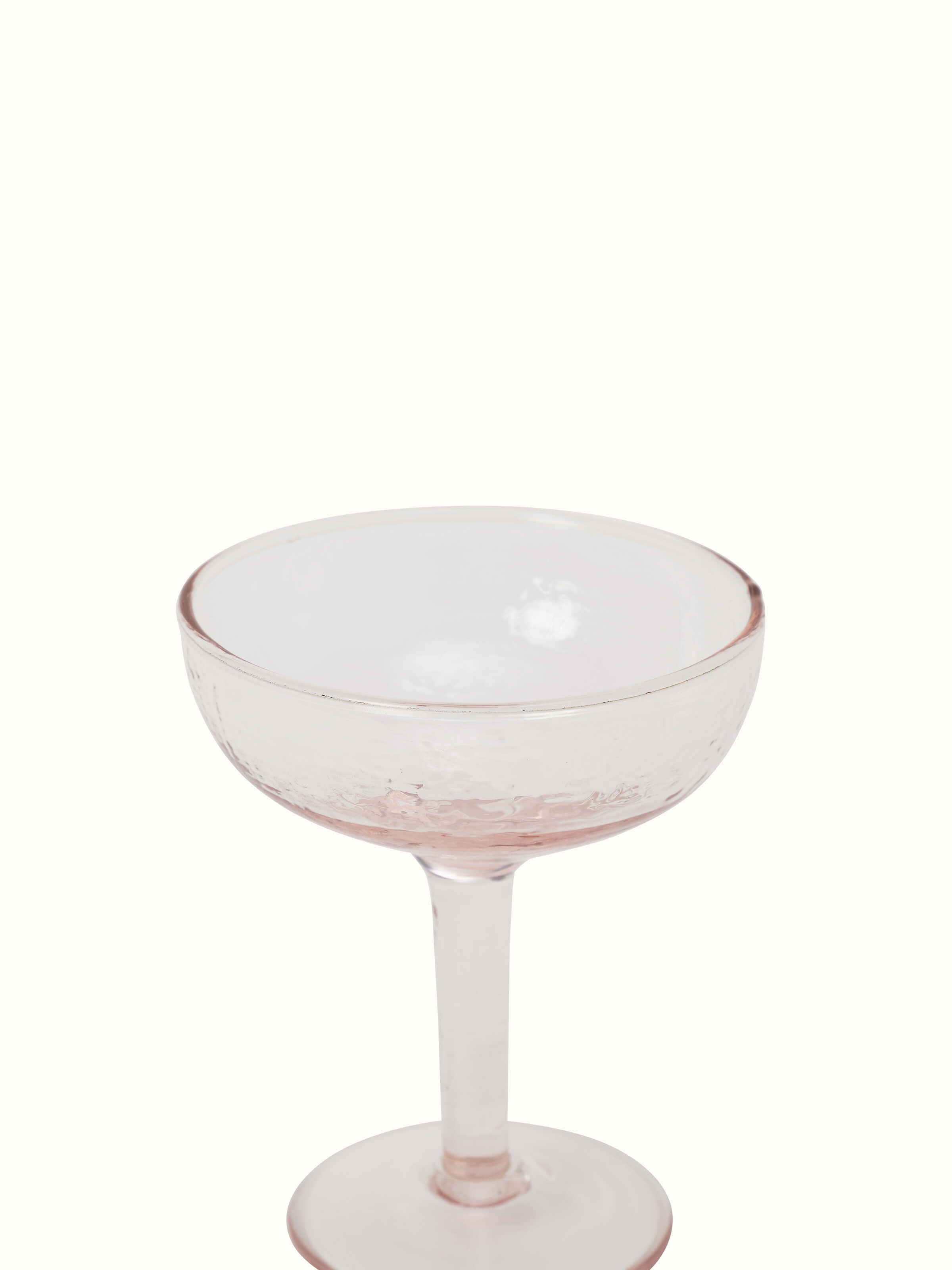 Angled view of glass-worked coupe glasses (2 pcs) by Swadesh, displaying the detailed glass pattern and classic style.