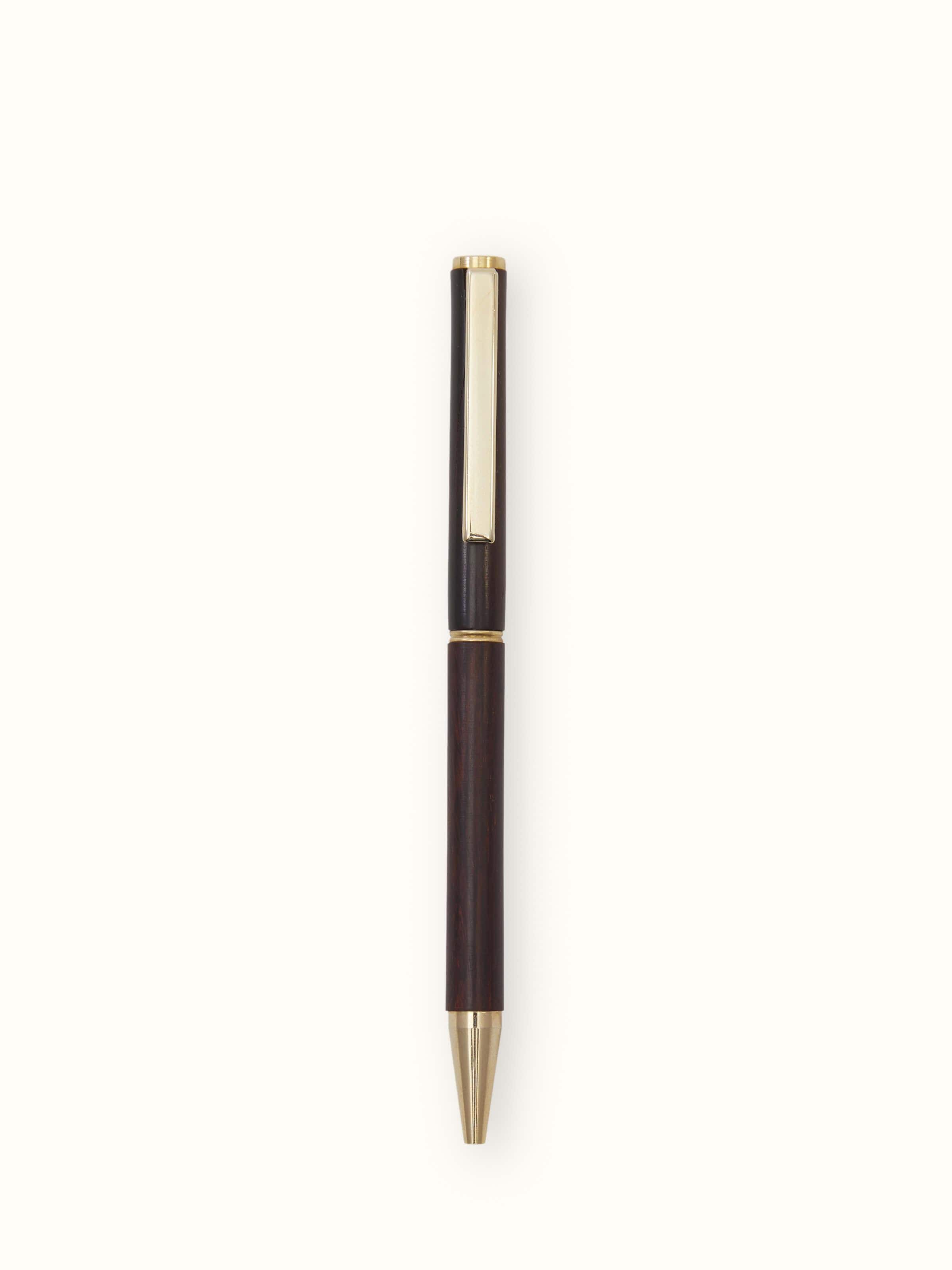 Front view of Carved Rosewood Pen with detailed engravings and a polished finish