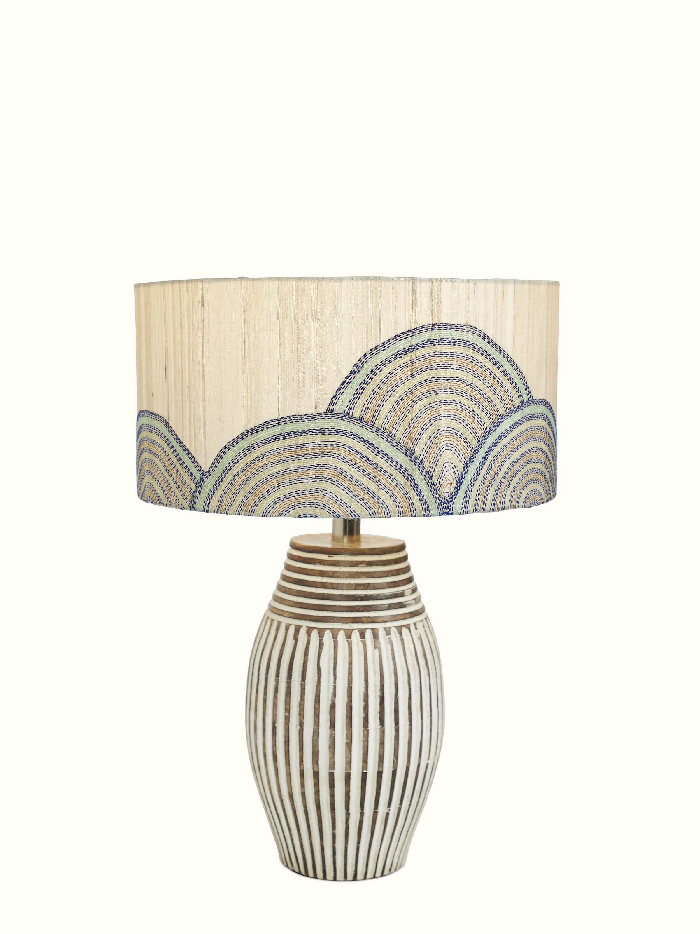 Front view of Sujani hand-embroidered cotton lampshade in beige color displaying intricate embroidery