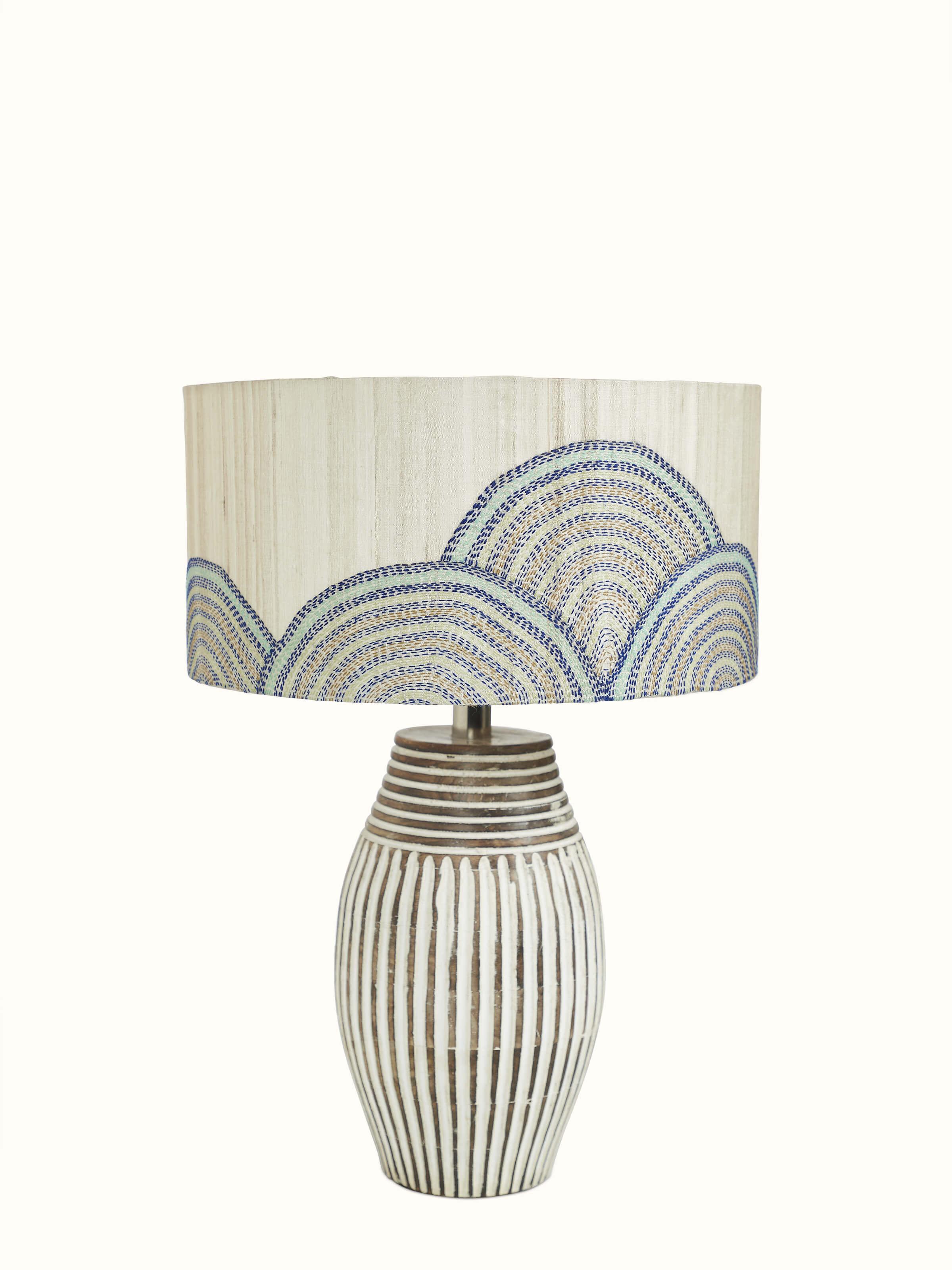 Close-up view of Sujani hand-embroidered cotton lampshade in beige color highlighting the embroidery
