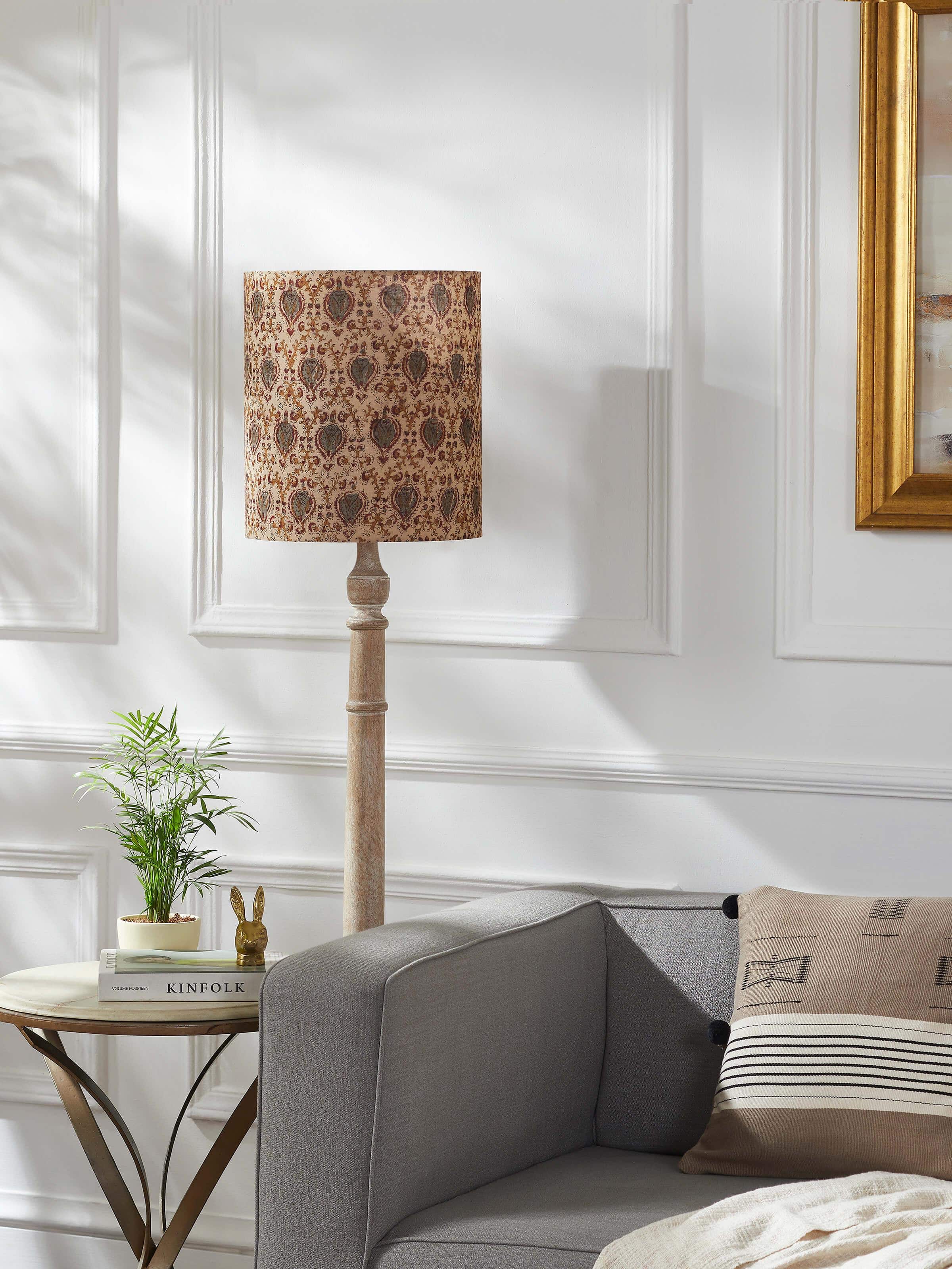Close-up view of Kalamkari block-printed cotton lampshade in fawn color, highlighting intricate designs and texture.