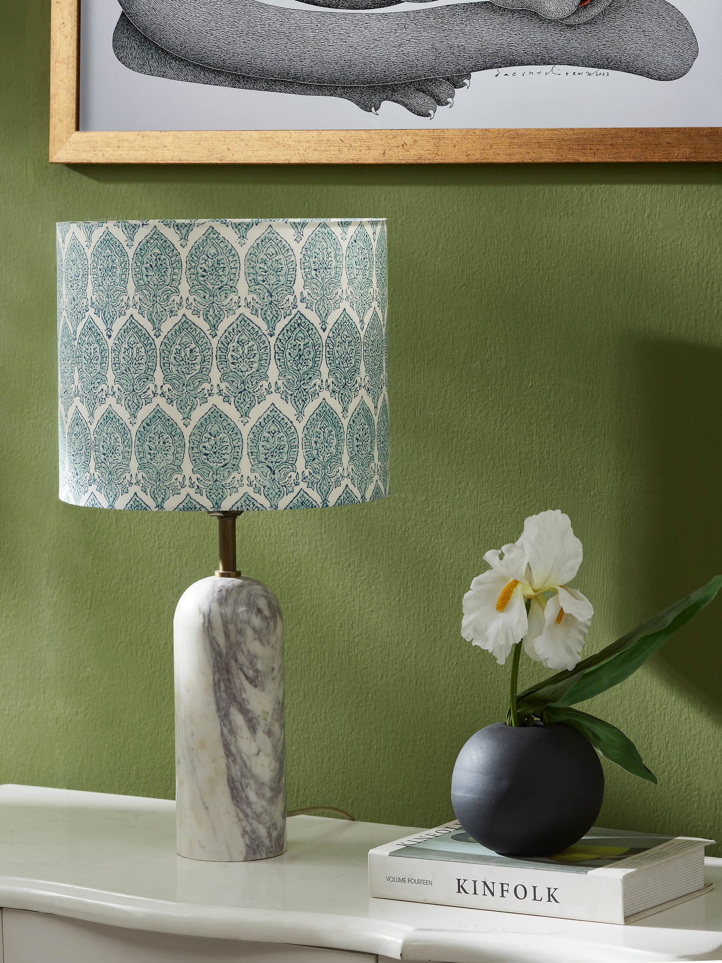 Side view of block-printed cotton lampshade in blue & white color showcasing the intricate print design and texture