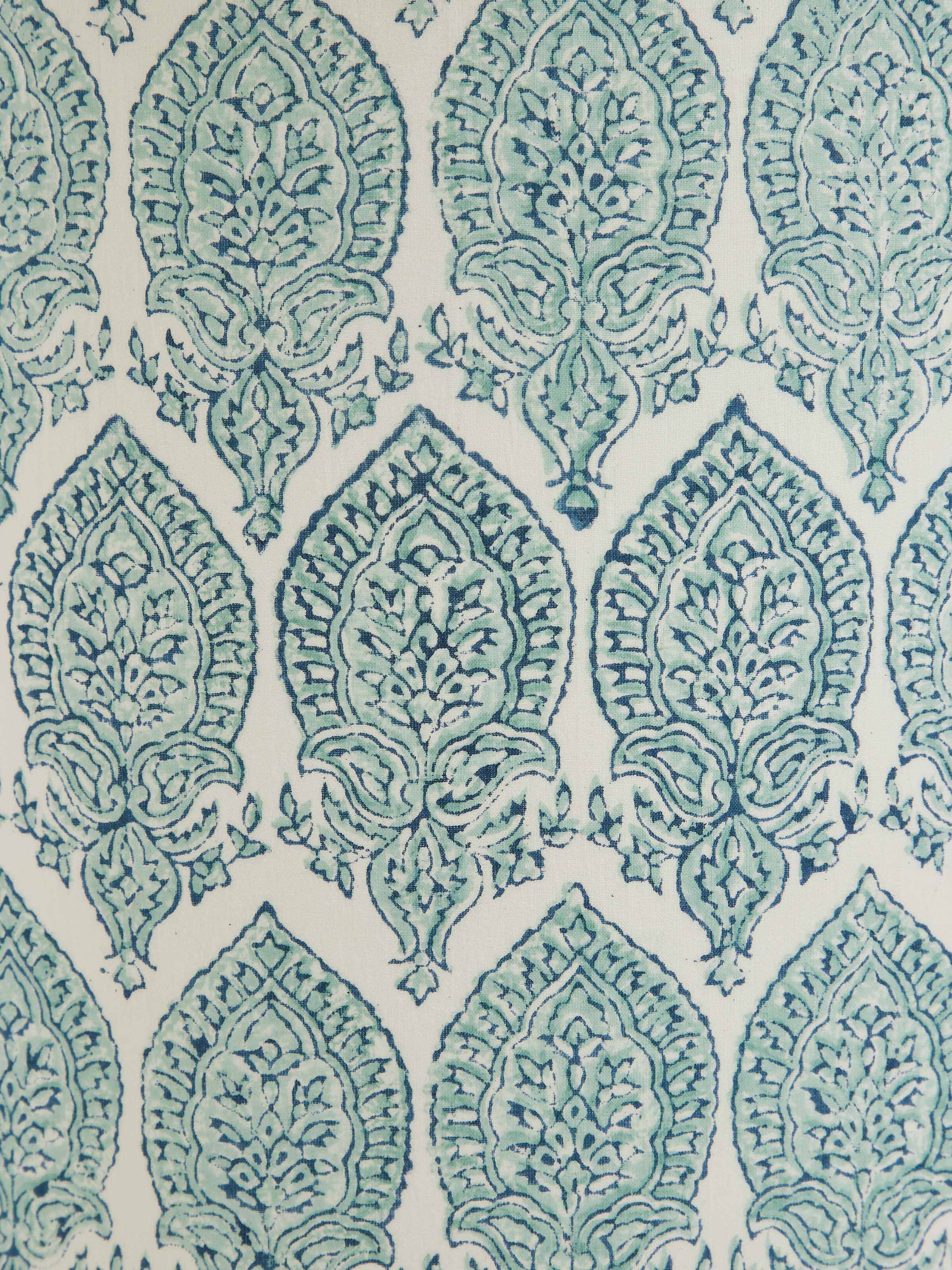 Detailed view of block-printed cotton lampshade in blue & white color highlighting the precise print and fabric quality