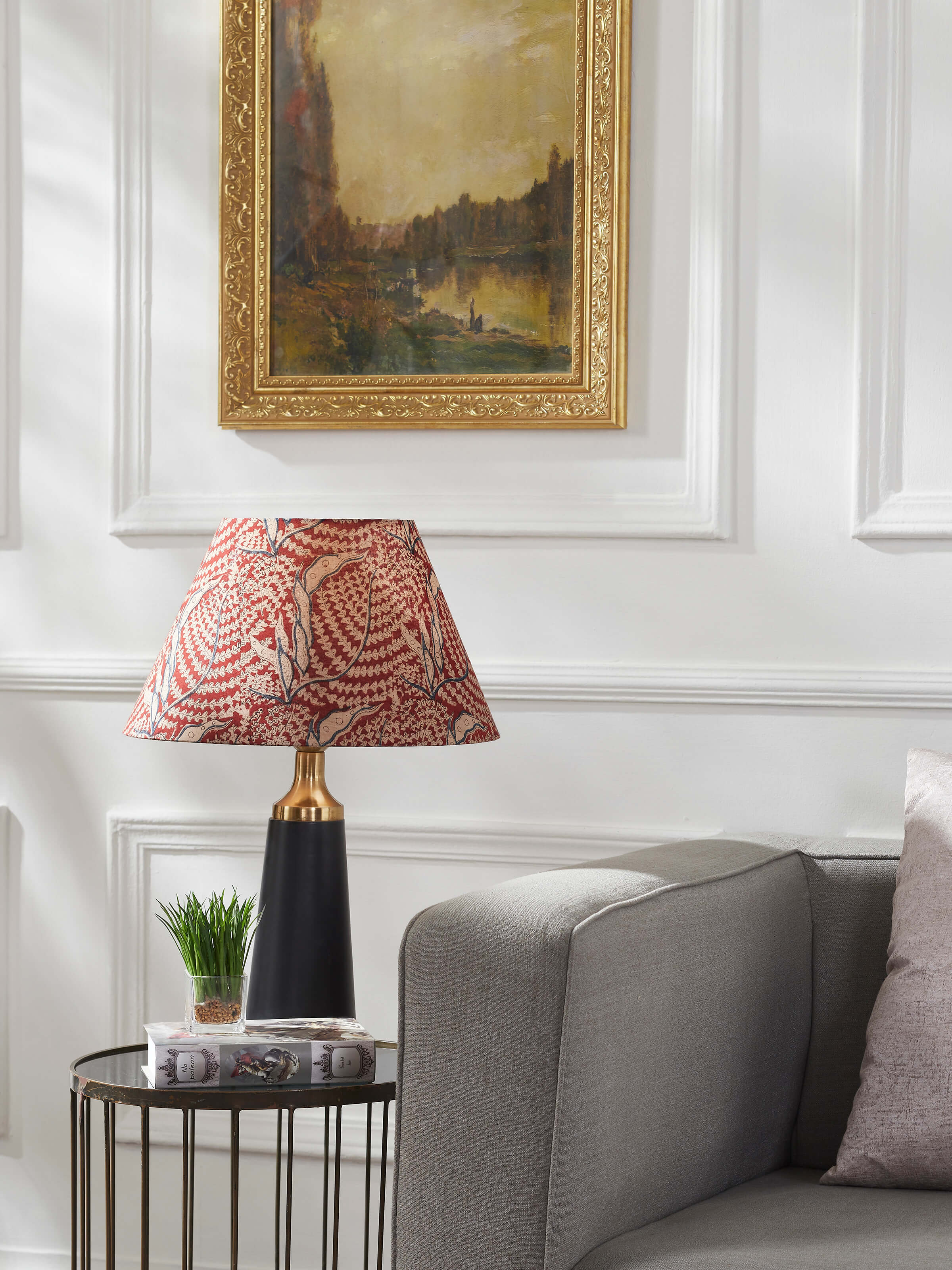 Side view of Kalamkari block-printed cotton lampshade in large maroon color highlighting the detailed block prints