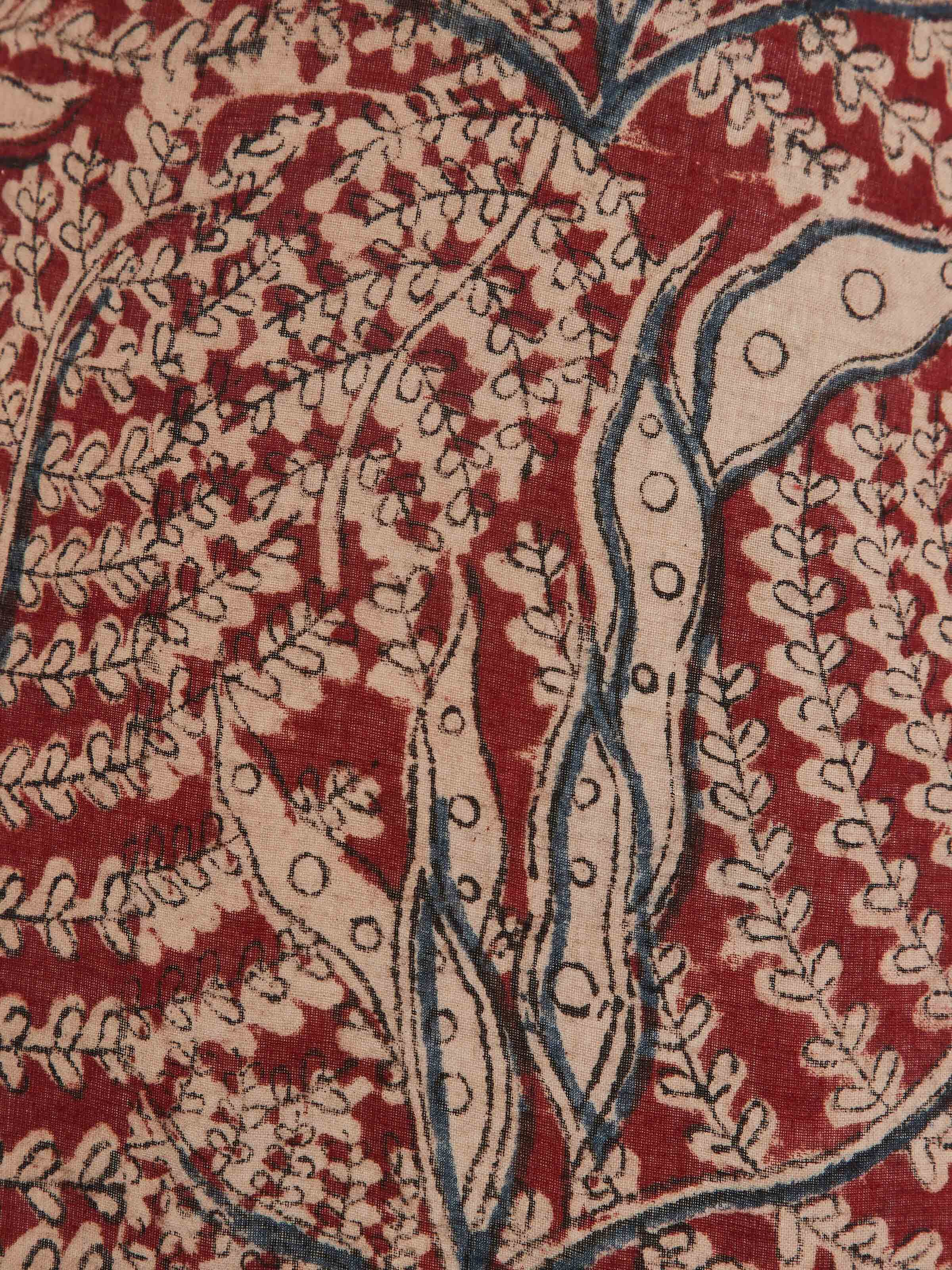 Close-up of Kalamkari block-printed cotton lampshade in large maroon color focusing on the intricate block-printing technique