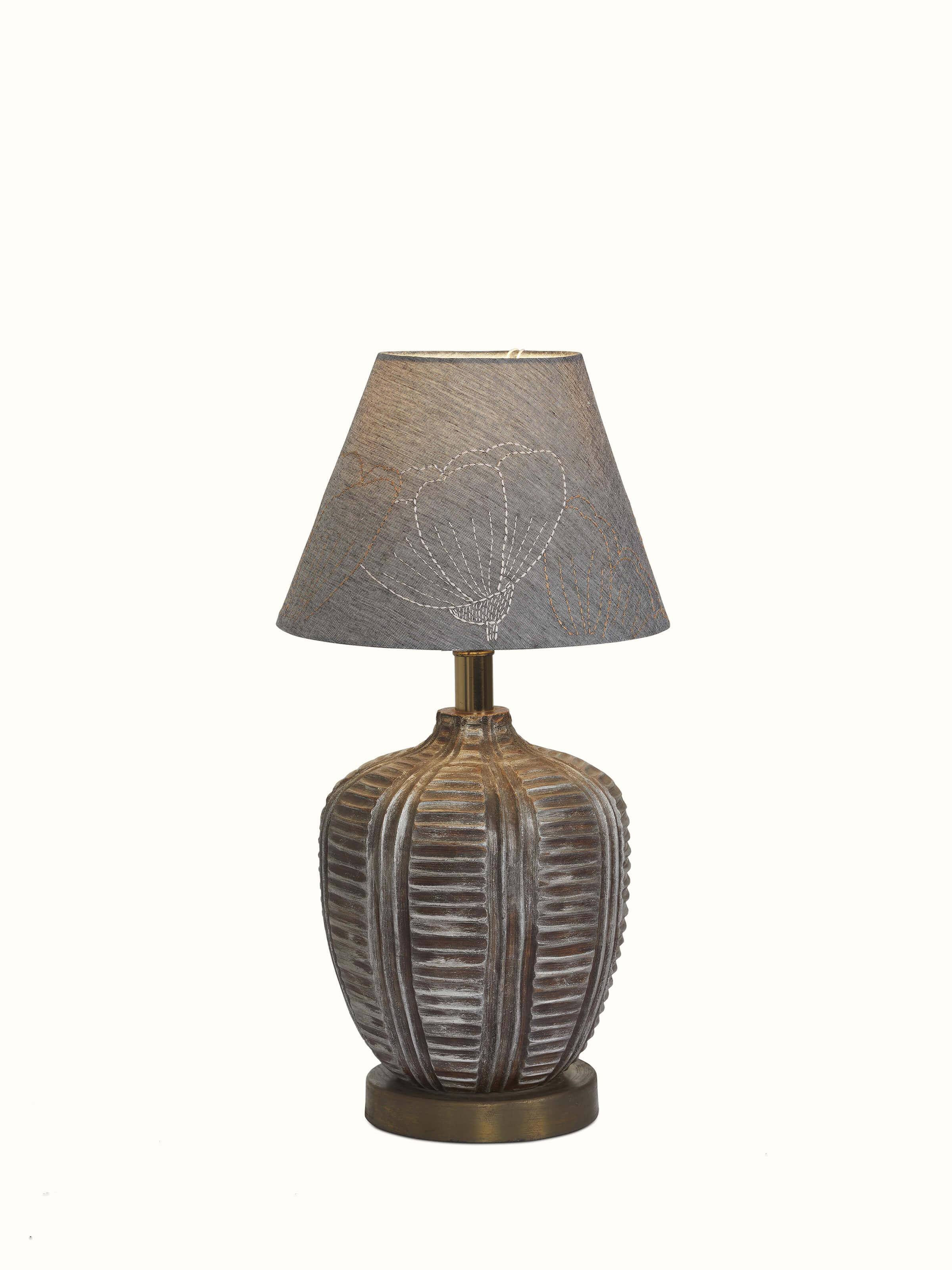 Angled view of Sujani embroidered cotton lampshade in medium grey color displaying its refined embroidery and stylish appearance