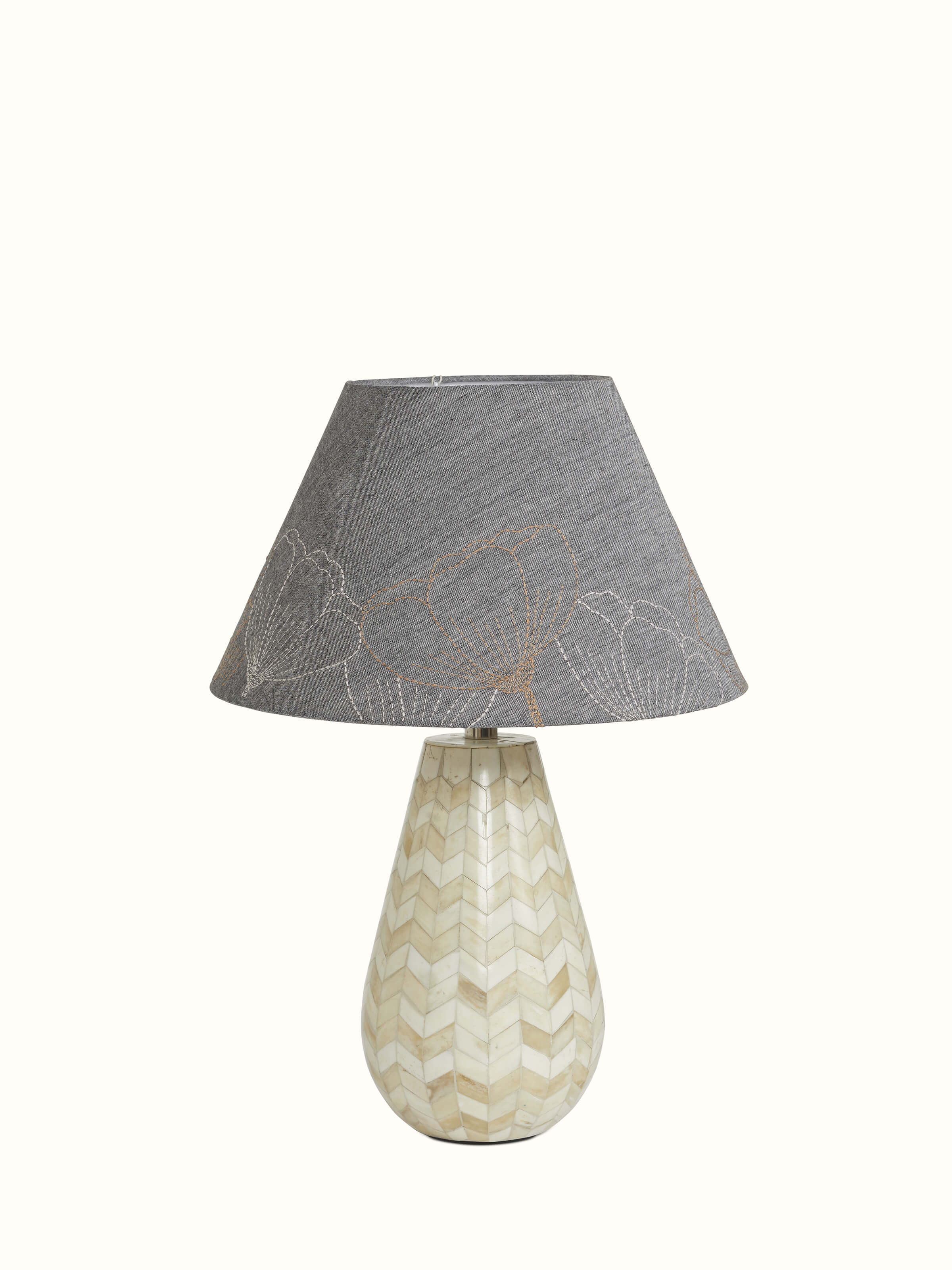 Large grey Sujani embroidered cotton lampshade, showcasing intricate embroidery patterns and soft grey fabric.