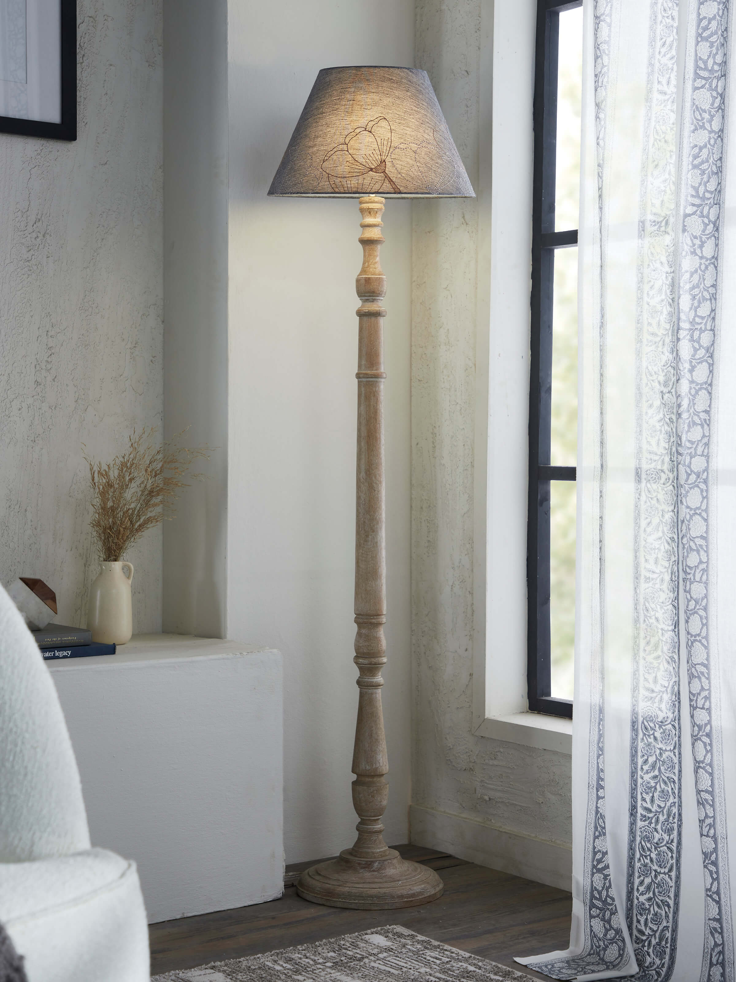 Close-up of Sujani embroidered cotton lampshade in grey, highlighting the detailed embroidery and fabric texture.