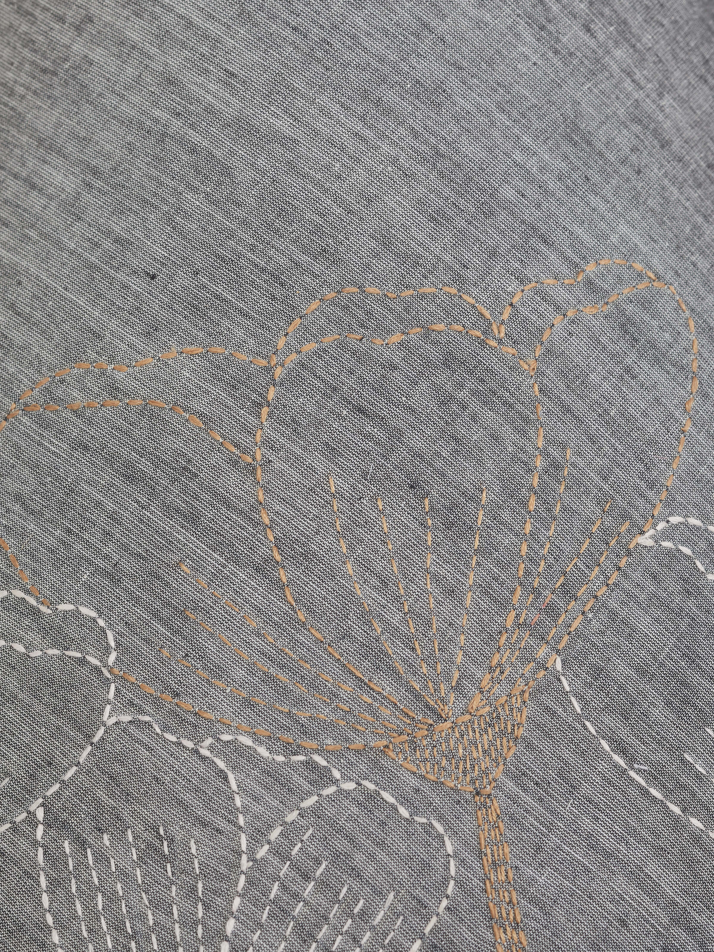 Side view of Sujani embroidered cotton lampshade (large, grey), emphasizing the lamp's shape and embroidery detail.