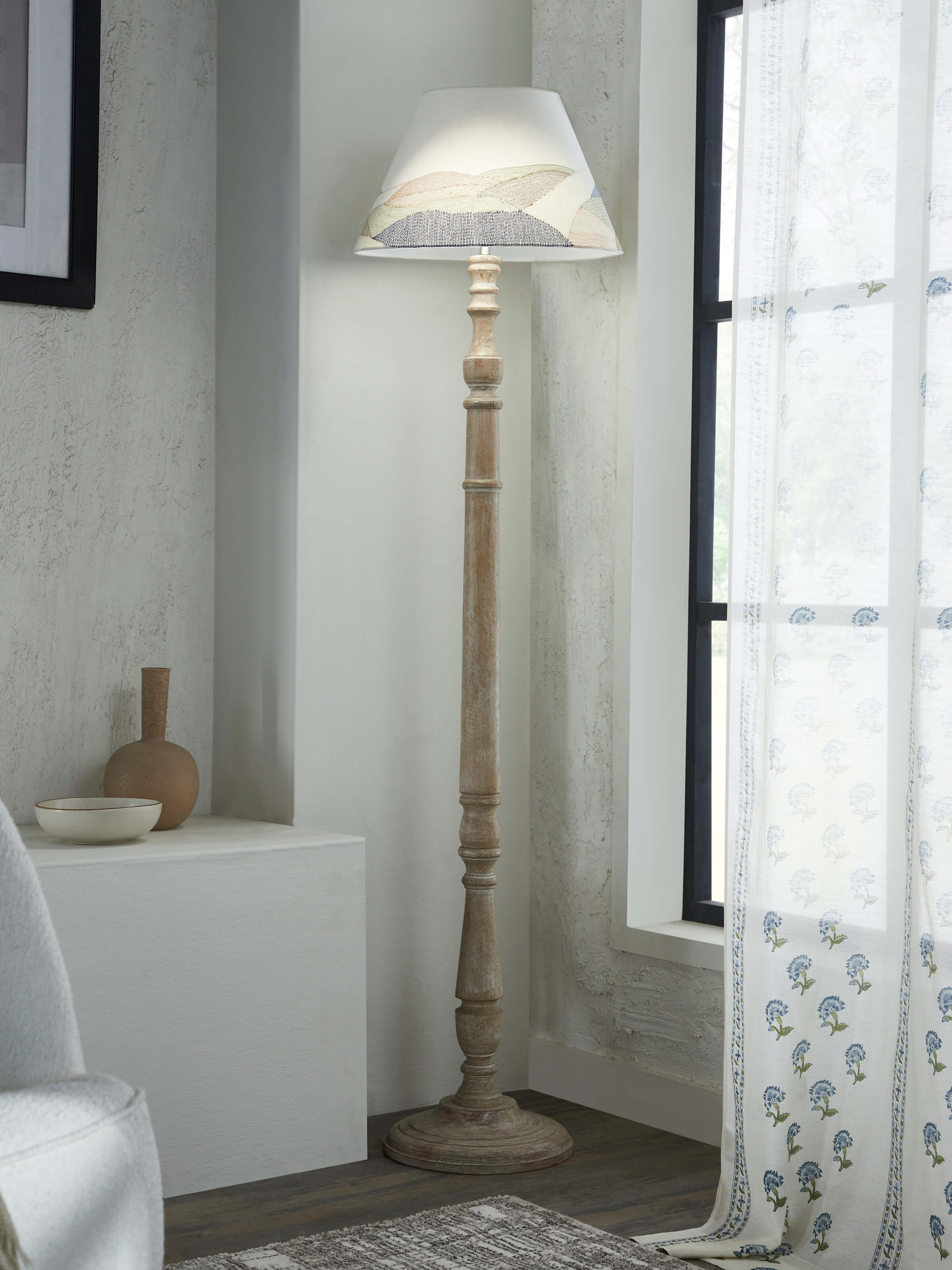 Side view of Sujani embroidered cotton lampshade in large white color, highlighting the intricate stitching.